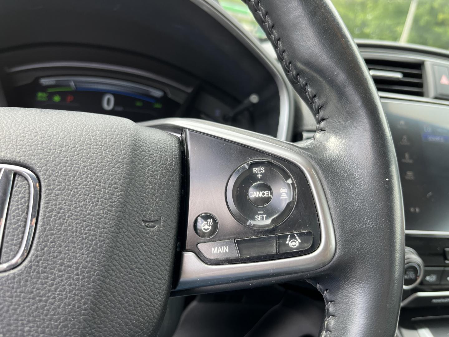 2022 Blue Honda CR-V Hybrid EX-L (5J6RT6H84NL) with an 2.0L I4 DOHC 16V HYBRID engine, Automatic transmission, located at 11115 Chardon Rd. , Chardon, OH, 44024, (440) 214-9705, 41.580246, -81.241943- Photo#21