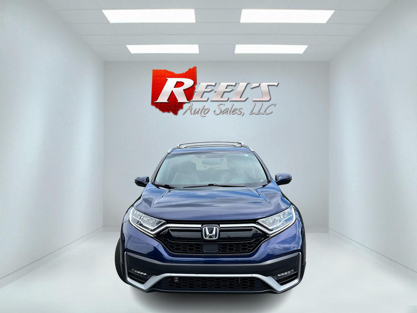 2022 Blue Honda CR-V Hybrid EX-L (5J6RT6H84NL) with an 2.0L I4 DOHC 16V HYBRID engine, Automatic transmission, located at 11115 Chardon Rd. , Chardon, OH, 44024, (440) 214-9705, 41.580246, -81.241943- Photo#1