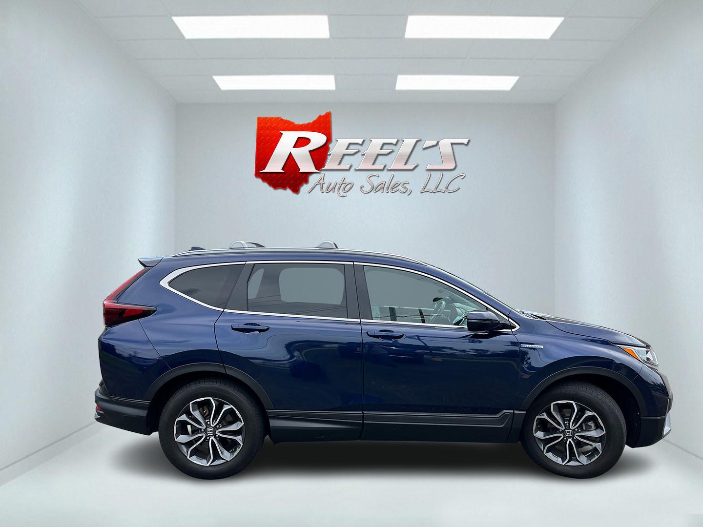2022 Blue Honda CR-V Hybrid EX-L (5J6RT6H84NL) with an 2.0L I4 DOHC 16V HYBRID engine, Automatic transmission, located at 11115 Chardon Rd. , Chardon, OH, 44024, (440) 214-9705, 41.580246, -81.241943- Photo#5