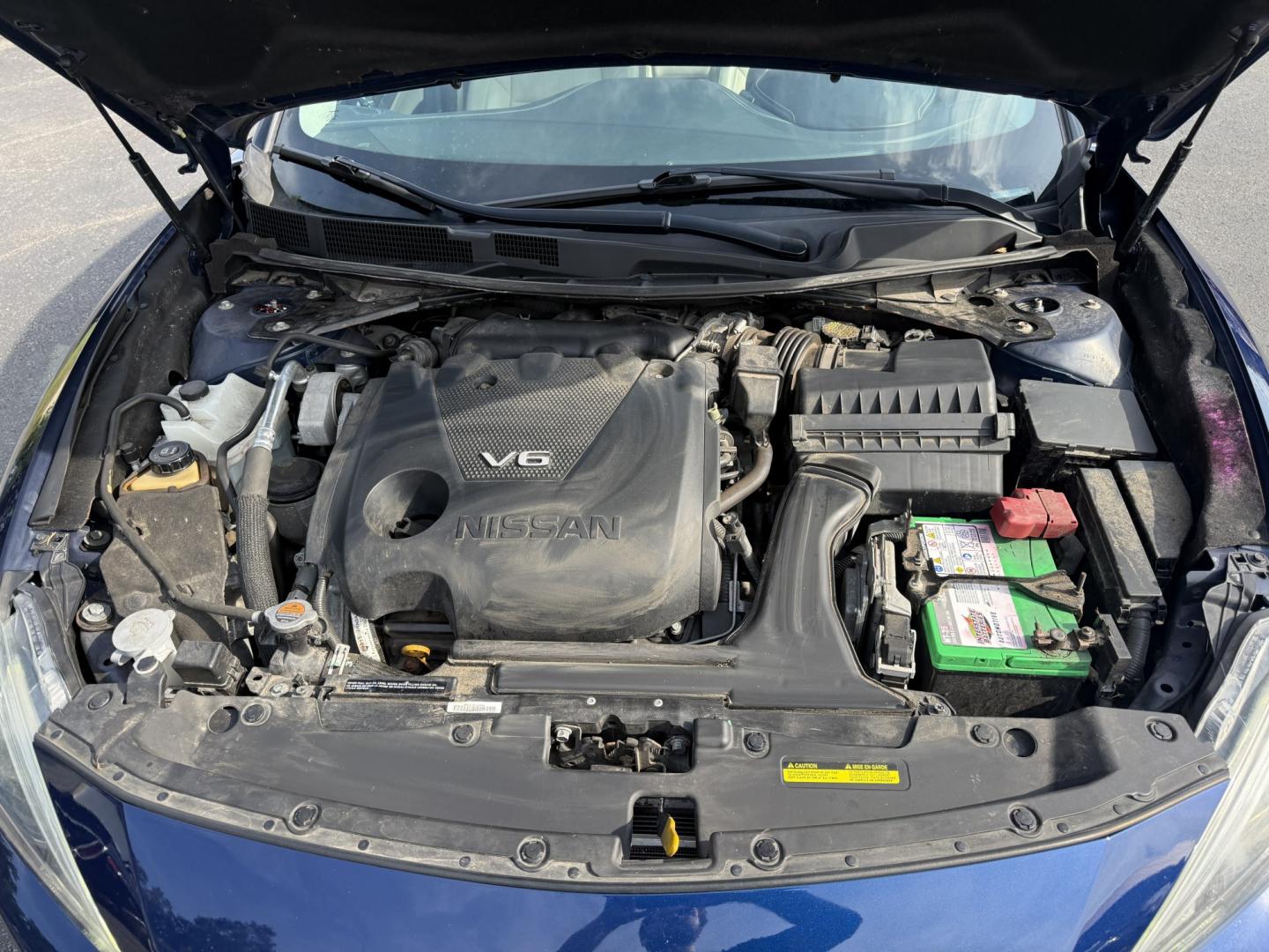 2016 Blue /Tan Nissan Maxima 3.5 SV (1N4AA6AP6GC) with an 3.5L V6 DOHC 24V engine, Automatic transmission, located at 547 E. Main St., Orwell, OH, 44076, (440) 437-5893, 41.535435, -80.847855 - 2016 Nissan Maxima SV – A Sporty Sedan with Strong Power and Everyday Comfort If you want a midsize sedan that still feels energetic, this 2016 Nissan Maxima SV is a compelling choice. The 3.5L V6 produces 300 horsepower and can move from 0-60 in 5.8 seconds, while Sport Mode sharpens the respons- Photo#7