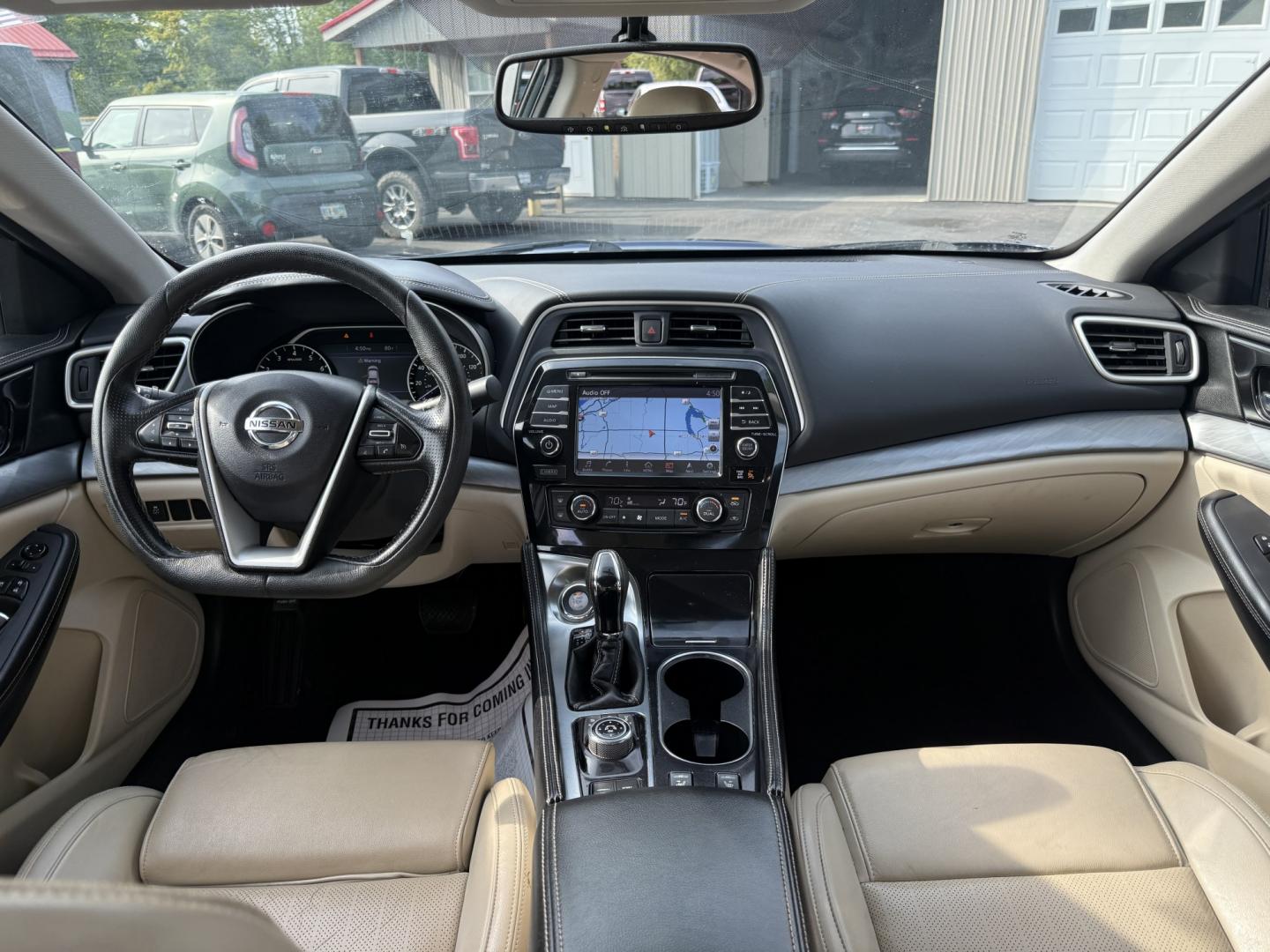 2016 Blue /Tan Nissan Maxima 3.5 SV (1N4AA6AP6GC) with an 3.5L V6 DOHC 24V engine, Automatic transmission, located at 547 E. Main St., Orwell, OH, 44076, (440) 437-5893, 41.535435, -80.847855 - 2016 Nissan Maxima SV – A Sporty Sedan with Strong Power and Everyday Comfort If you want a midsize sedan that still feels energetic, this 2016 Nissan Maxima SV is a compelling choice. The 3.5L V6 produces 300 horsepower and can move from 0-60 in 5.8 seconds, while Sport Mode sharpens the respons- Photo#23