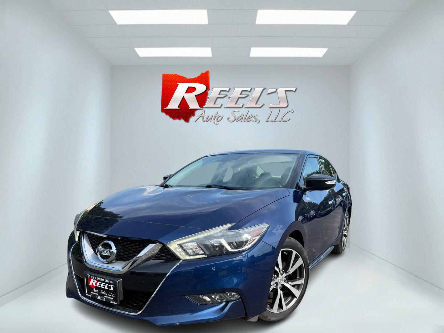 2016 Blue /Tan Nissan Maxima 3.5 SV (1N4AA6AP6GC) with an 3.5L V6 DOHC 24V engine, Automatic transmission, located at 547 E. Main St., Orwell, OH, 44076, (440) 437-5893, 41.535435, -80.847855 - 2016 Nissan Maxima SV – A Sporty Sedan with Strong Power and Everyday Comfort If you want a midsize sedan that still feels energetic, this 2016 Nissan Maxima SV is a compelling choice. The 3.5L V6 produces 300 horsepower and can move from 0-60 in 5.8 seconds, while Sport Mode sharpens the respons- Photo#0