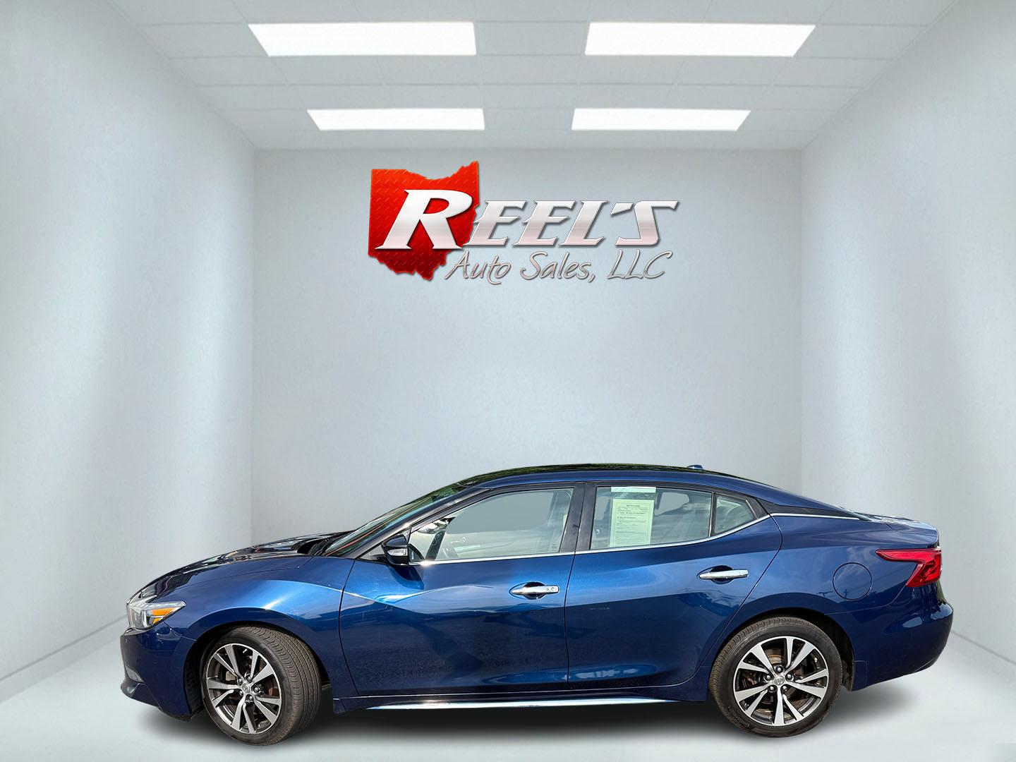 2016 Blue /Tan Nissan Maxima 3.5 SV (1N4AA6AP6GC) with an 3.5L V6 DOHC 24V engine, Automatic transmission, located at 547 E. Main St., Orwell, OH, 44076, (440) 437-5893, 41.535435, -80.847855 - 2016 Nissan Maxima SV – A Sporty Sedan with Strong Power and Everyday Comfort If you want a midsize sedan that still feels energetic, this 2016 Nissan Maxima SV is a compelling choice. The 3.5L V6 produces 300 horsepower and can move from 0-60 in 5.8 seconds, while Sport Mode sharpens the respons- Photo#32