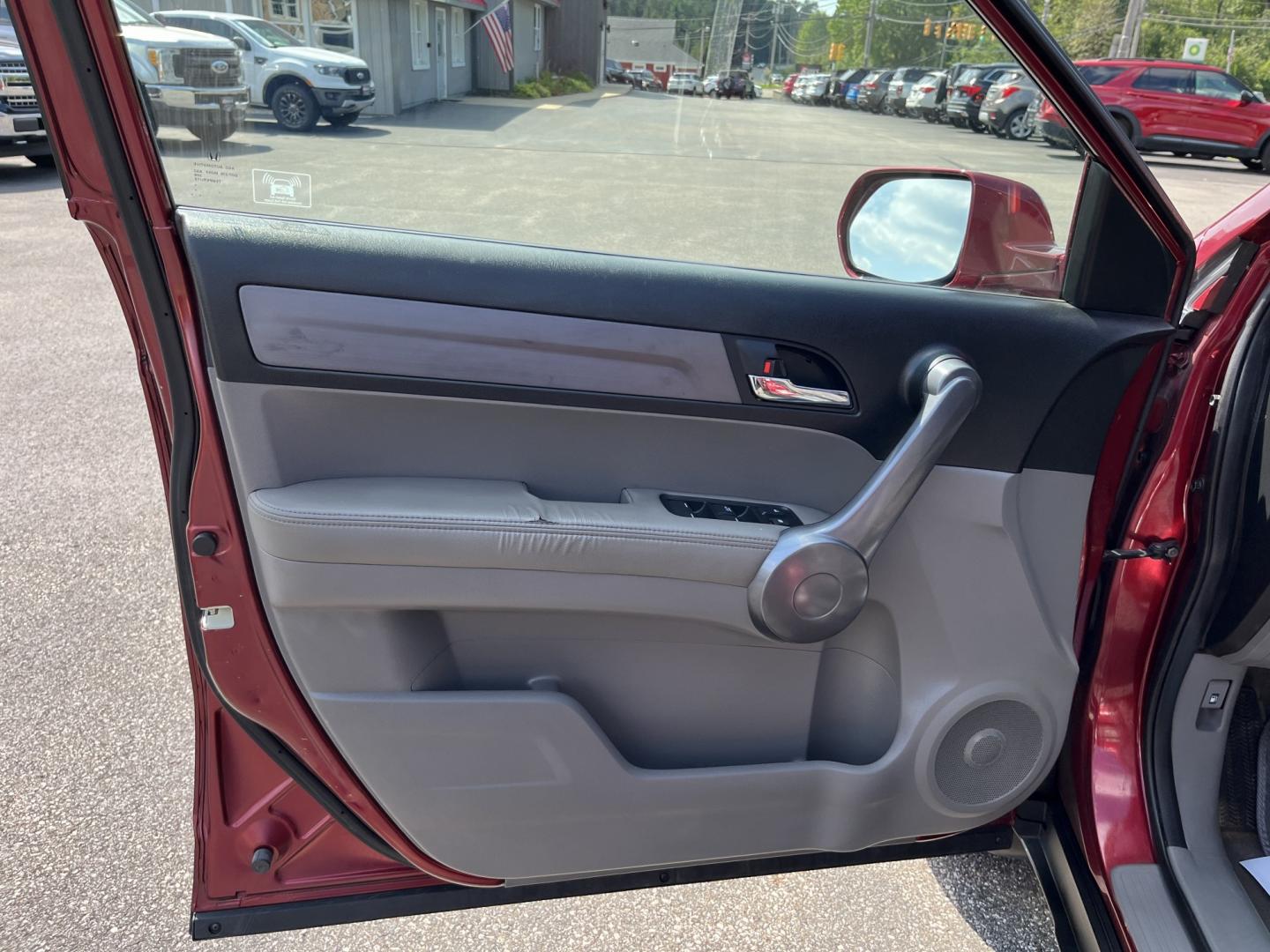 2009 Red /Gray Honda CR-V EX-L 4WD 5-Speed AT (5J6RE48749L) with an 2.4L I4 DOHC 16V engine, Automatic transmission, located at 11115 Chardon Rd. , Chardon, OH, 44024, (440) 214-9705, 41.580246, -81.241943- Photo#13