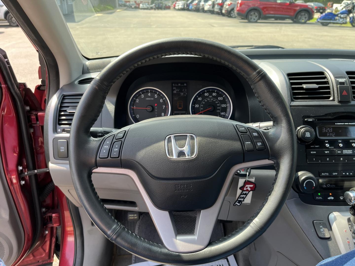 2009 Red /Gray Honda CR-V EX-L 4WD 5-Speed AT (5J6RE48749L) with an 2.4L I4 DOHC 16V engine, Automatic transmission, located at 11115 Chardon Rd. , Chardon, OH, 44024, (440) 214-9705, 41.580246, -81.241943- Photo#16