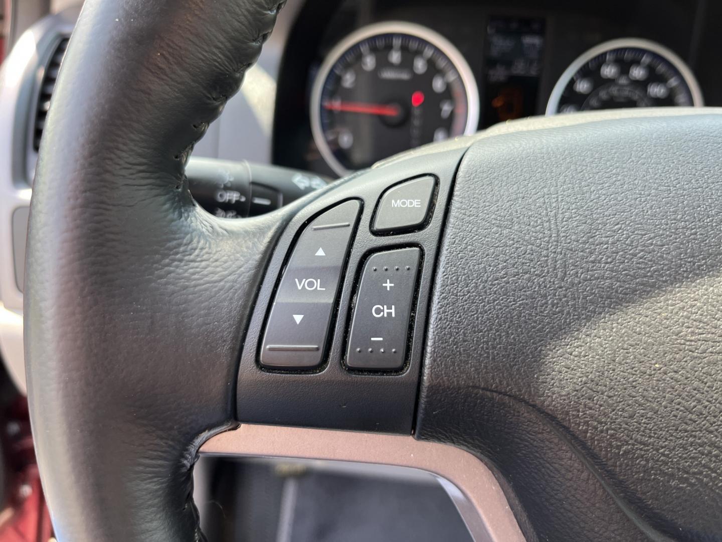 2009 Red /Gray Honda CR-V EX-L 4WD 5-Speed AT (5J6RE48749L) with an 2.4L I4 DOHC 16V engine, Automatic transmission, located at 11115 Chardon Rd. , Chardon, OH, 44024, (440) 214-9705, 41.580246, -81.241943- Photo#17