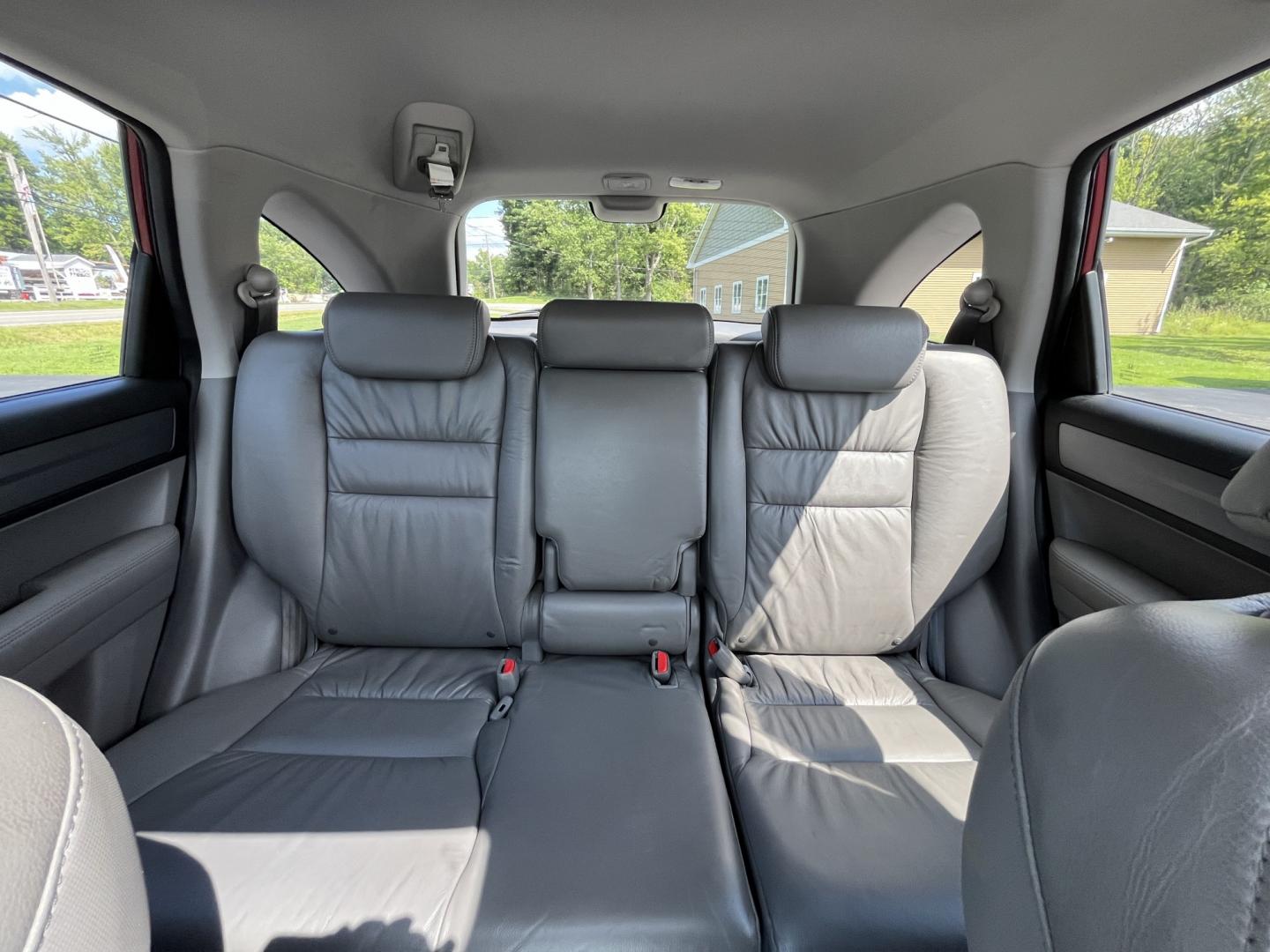 2009 Red /Gray Honda CR-V EX-L 4WD 5-Speed AT (5J6RE48749L) with an 2.4L I4 DOHC 16V engine, Automatic transmission, located at 11115 Chardon Rd. , Chardon, OH, 44024, (440) 214-9705, 41.580246, -81.241943- Photo#20