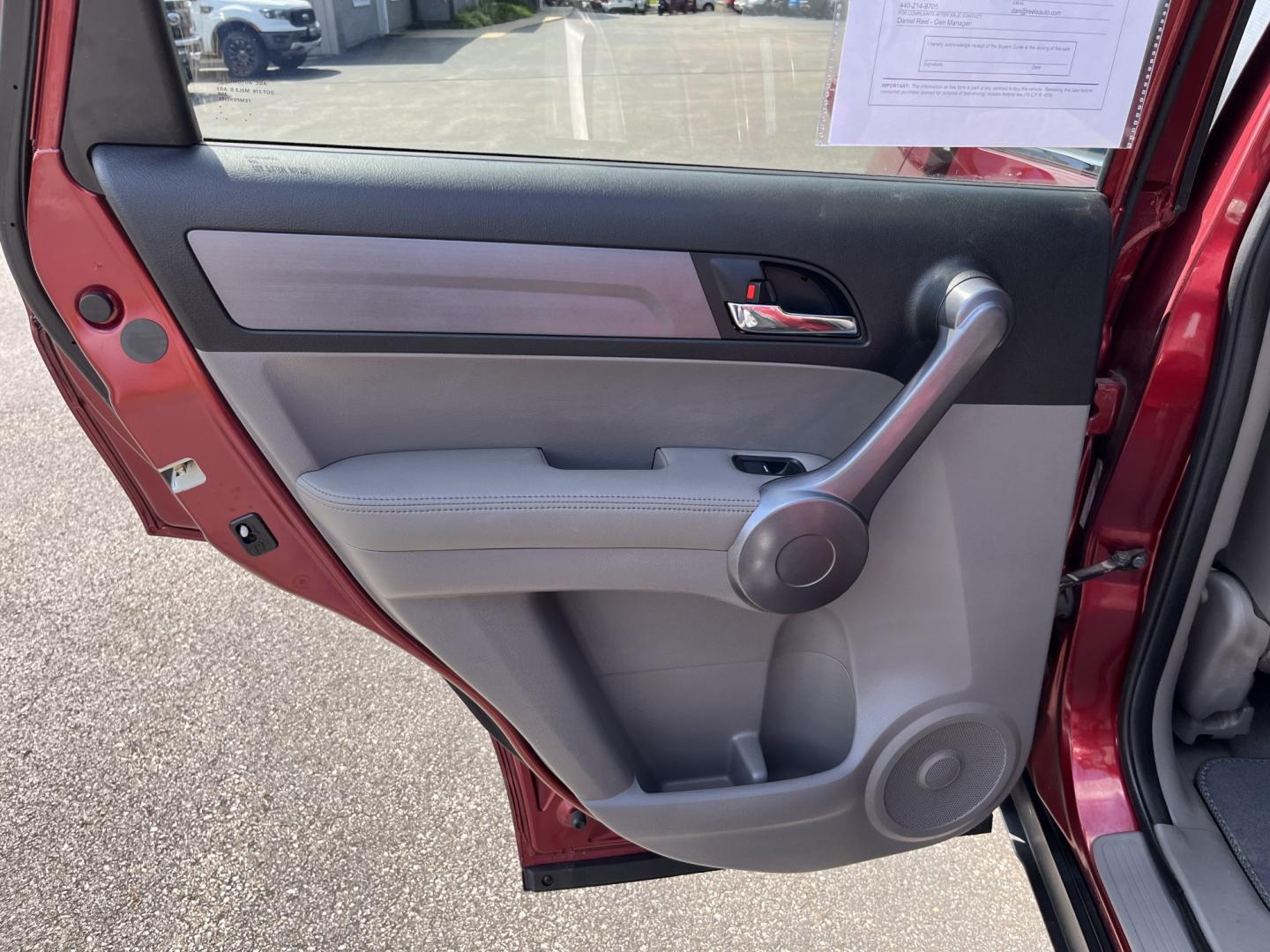 2009 Red /Gray Honda CR-V EX-L 4WD 5-Speed AT (5J6RE48749L) with an 2.4L I4 DOHC 16V engine, Automatic transmission, located at 11115 Chardon Rd. , Chardon, OH, 44024, (440) 214-9705, 41.580246, -81.241943- Photo#21