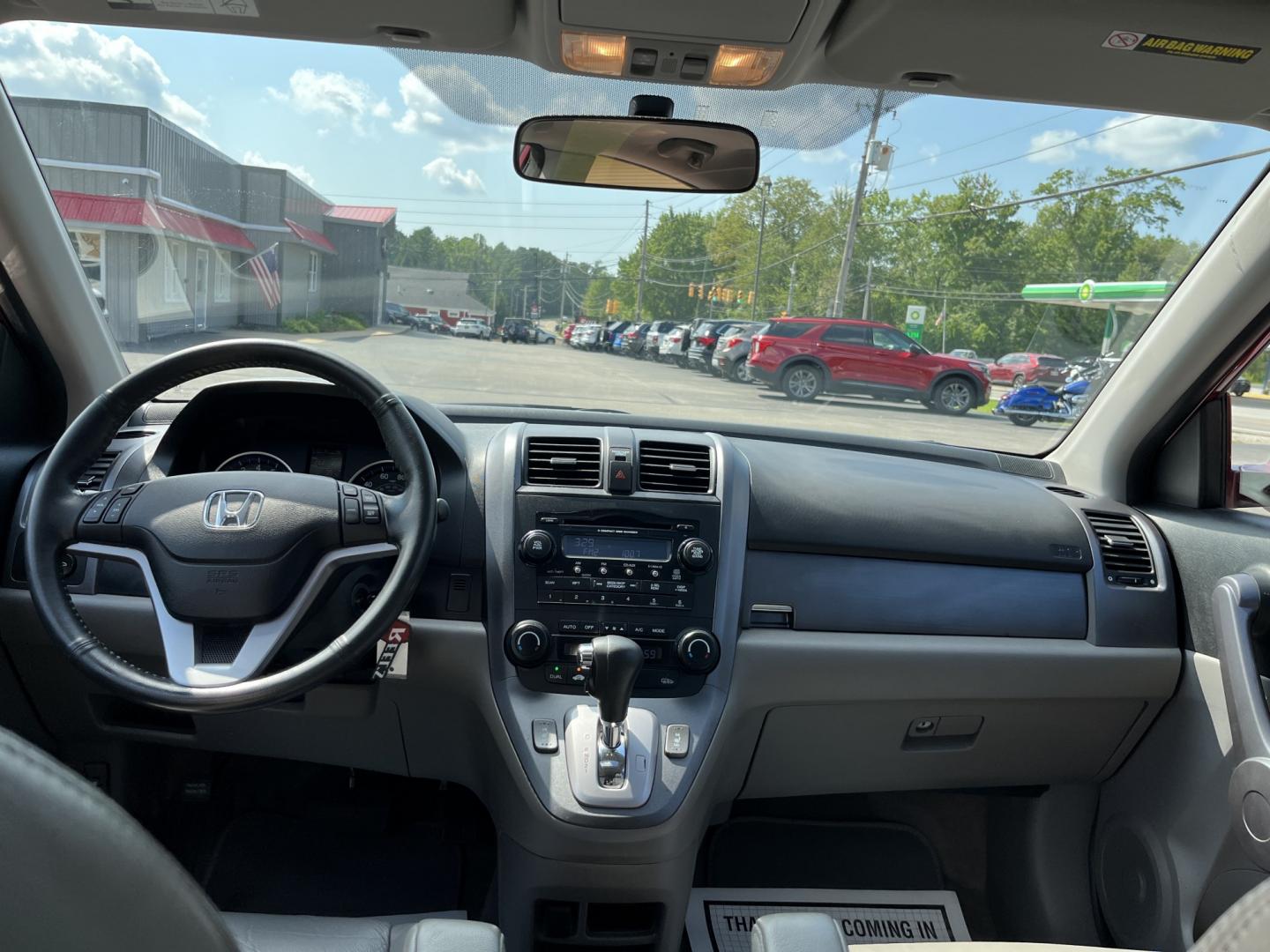 2009 Red /Gray Honda CR-V EX-L 4WD 5-Speed AT (5J6RE48749L) with an 2.4L I4 DOHC 16V engine, Automatic transmission, located at 11115 Chardon Rd. , Chardon, OH, 44024, (440) 214-9705, 41.580246, -81.241943- Photo#23