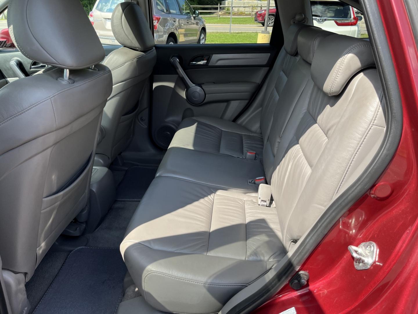 2009 Red /Gray Honda CR-V EX-L 4WD 5-Speed AT (5J6RE48749L) with an 2.4L I4 DOHC 16V engine, Automatic transmission, located at 11115 Chardon Rd. , Chardon, OH, 44024, (440) 214-9705, 41.580246, -81.241943- Photo#22