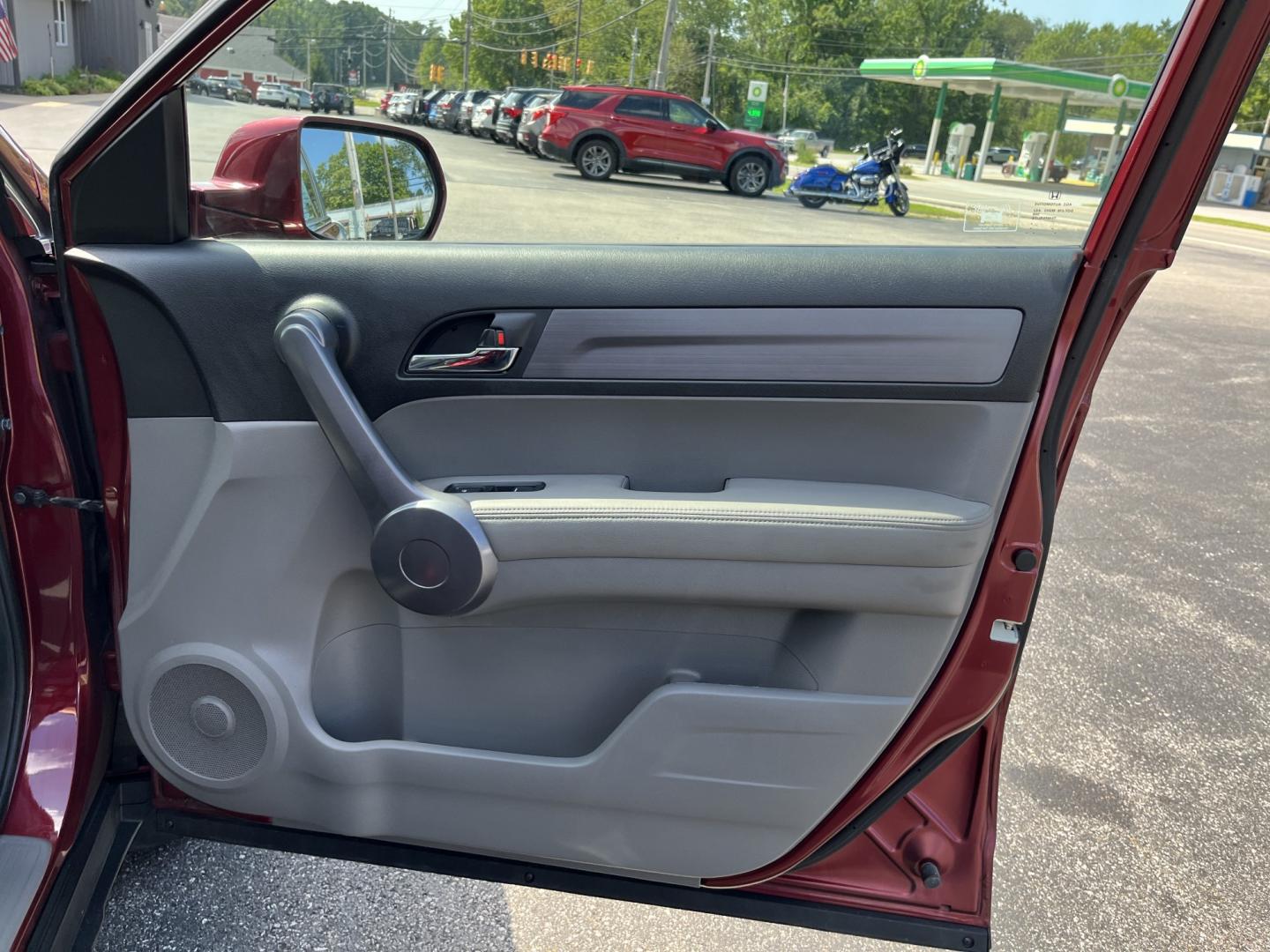 2009 Red /Gray Honda CR-V EX-L 4WD 5-Speed AT (5J6RE48749L) with an 2.4L I4 DOHC 16V engine, Automatic transmission, located at 11115 Chardon Rd. , Chardon, OH, 44024, (440) 214-9705, 41.580246, -81.241943- Photo#26