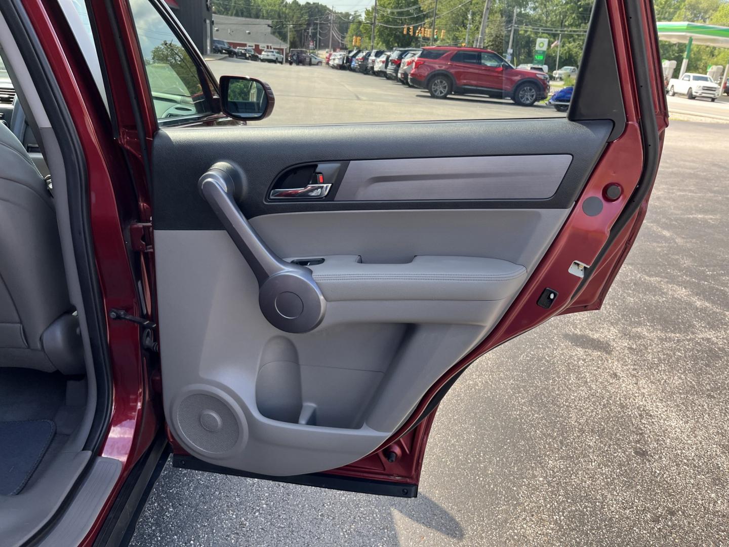 2009 Red /Gray Honda CR-V EX-L 4WD 5-Speed AT (5J6RE48749L) with an 2.4L I4 DOHC 16V engine, Automatic transmission, located at 11115 Chardon Rd. , Chardon, OH, 44024, (440) 214-9705, 41.580246, -81.241943- Photo#24