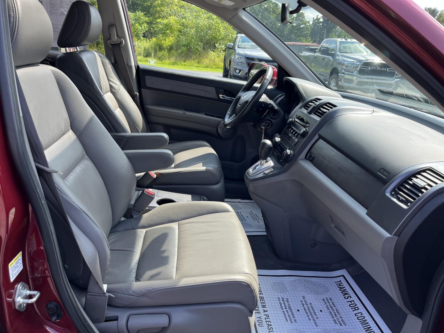 2009 Red /Gray Honda CR-V EX-L 4WD 5-Speed AT (5J6RE48749L) with an 2.4L I4 DOHC 16V engine, Automatic transmission, located at 11115 Chardon Rd. , Chardon, OH, 44024, (440) 214-9705, 41.580246, -81.241943- Photo#27