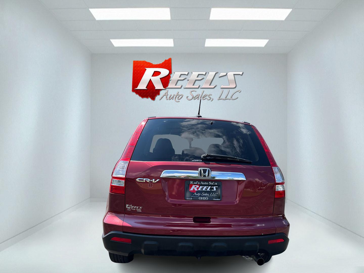 2009 Red /Gray Honda CR-V EX-L 4WD 5-Speed AT (5J6RE48749L) with an 2.4L I4 DOHC 16V engine, Automatic transmission, located at 11115 Chardon Rd. , Chardon, OH, 44024, (440) 214-9705, 41.580246, -81.241943- Photo#8