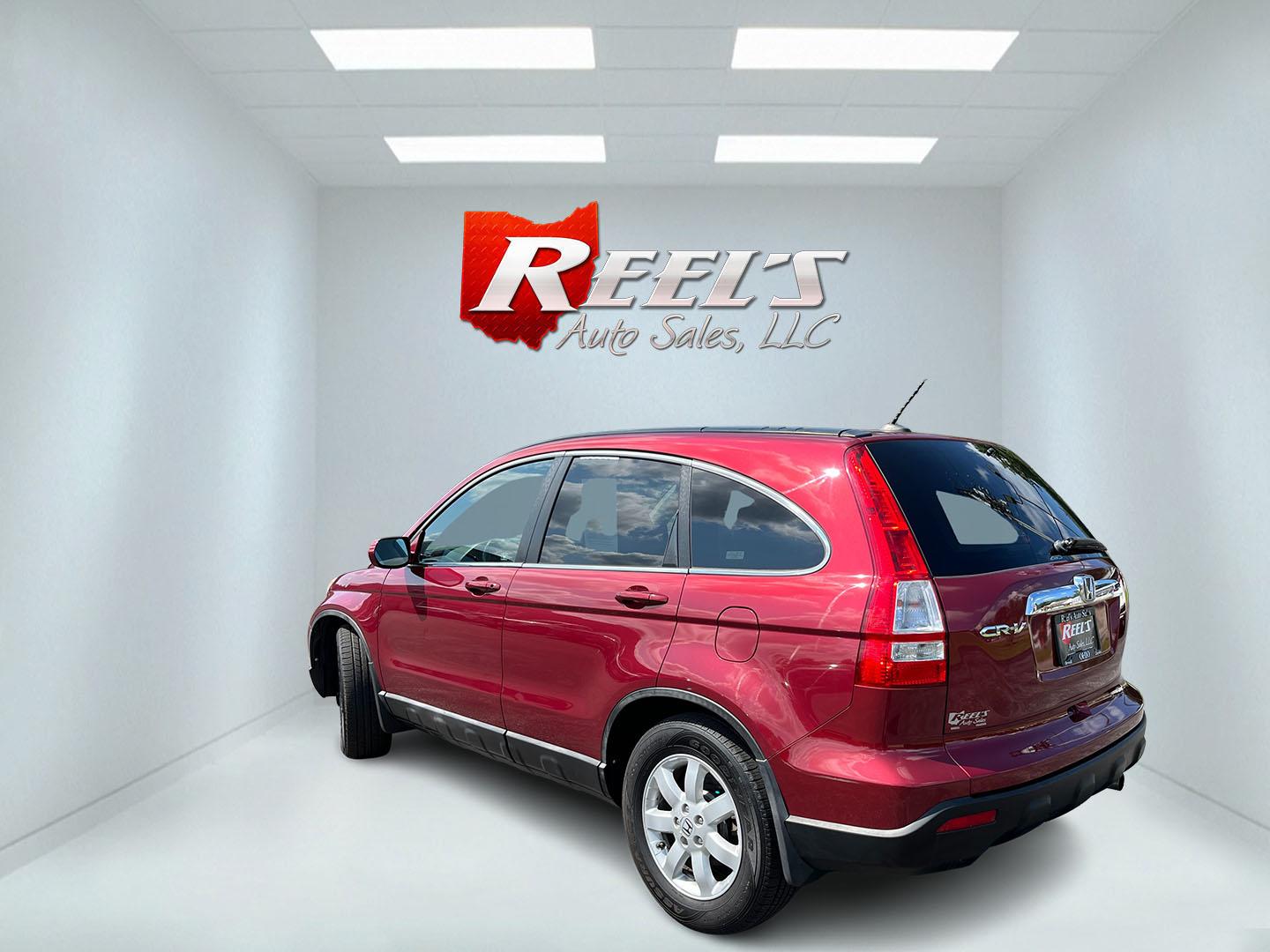 2009 Red /Gray Honda CR-V EX-L 4WD 5-Speed AT (5J6RE48749L) with an 2.4L I4 DOHC 16V engine, Automatic transmission, located at 11115 Chardon Rd. , Chardon, OH, 44024, (440) 214-9705, 41.580246, -81.241943- Photo#9