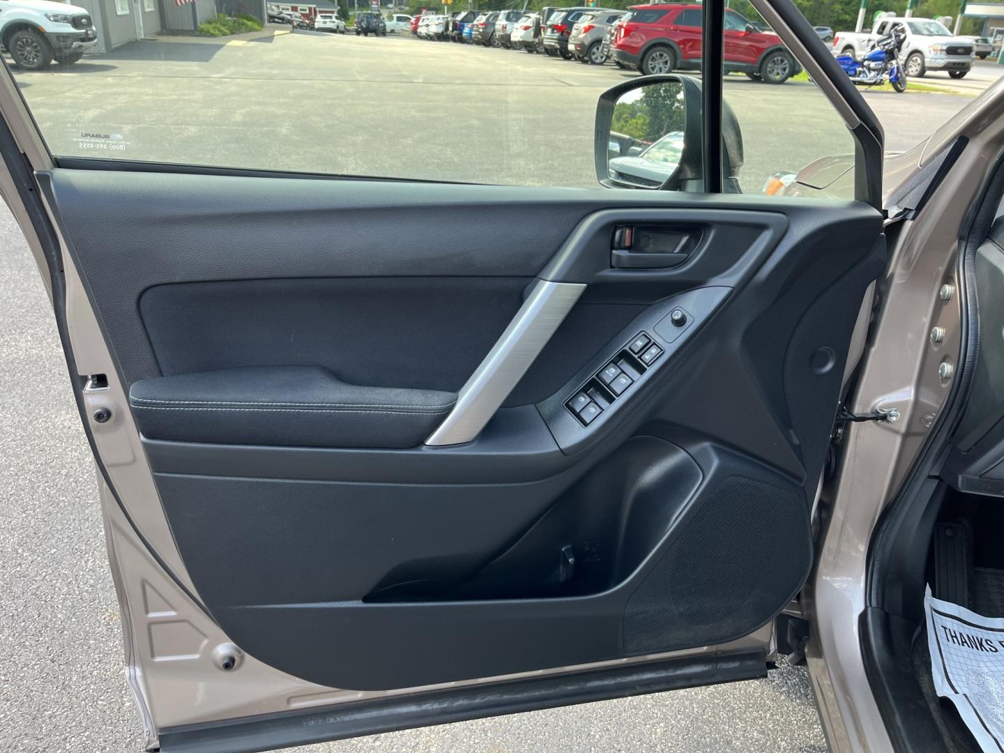 2015 Brown /Black Subaru Forester 2.5i (JF2SJAAC3FH) with an 2.5L H4 SOHC 16V engine, Automatic transmission, located at 11115 Chardon Rd. , Chardon, OH, 44024, (440) 214-9705, 41.580246, -81.241943 - 2015 Subaru Forester 2.5i PZEV – Practical AWD Capability with Strong Everyday Efficiency If you want a compact SUV that prioritizes confidence in changing conditions, this 2015 Subaru Forester 2.5i PZEV is a straightforward choice. The 2.5L engine pairs with Subaru’s full-time Symmetrical All-- Photo#14