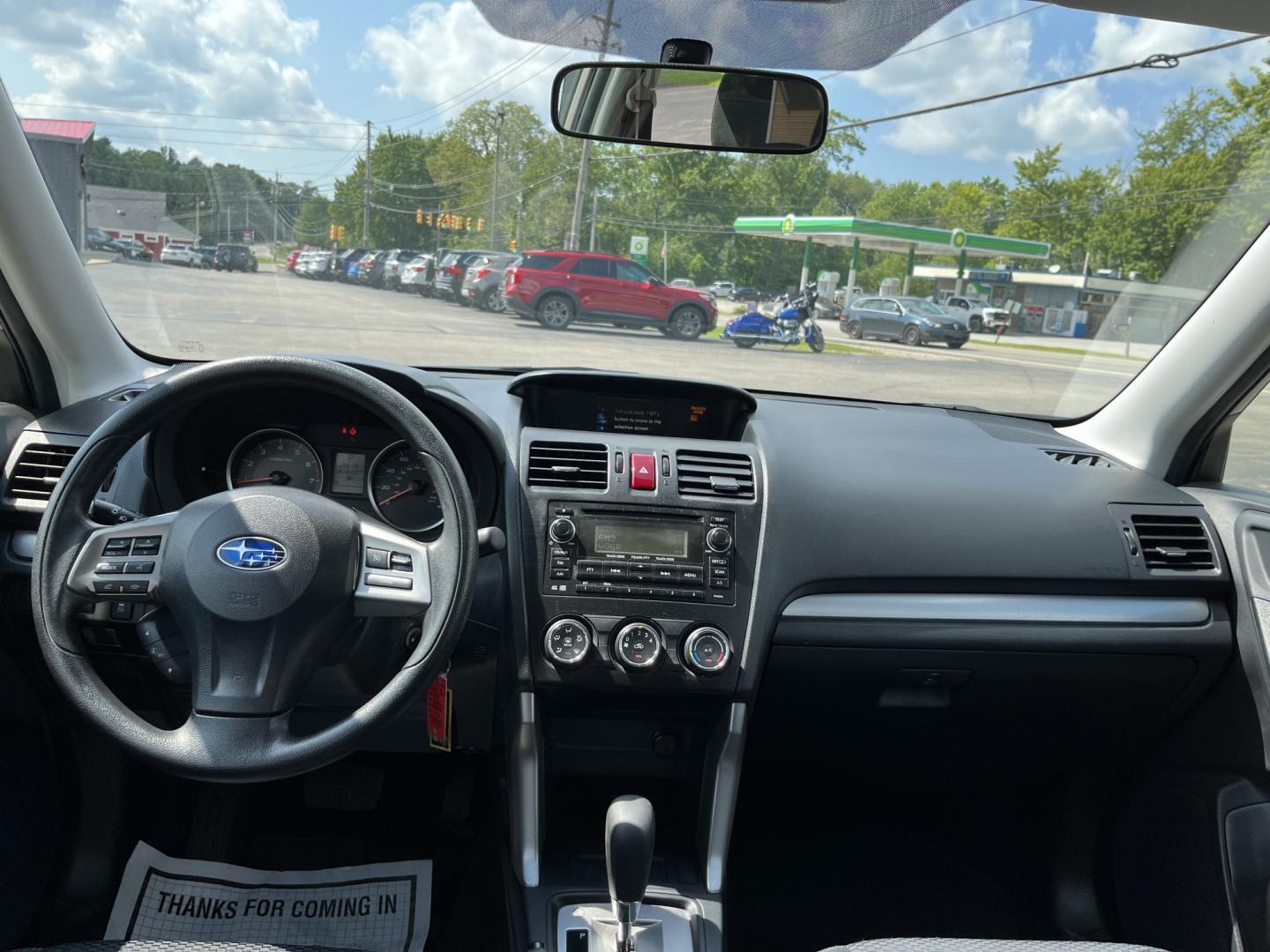 2015 Brown /Black Subaru Forester 2.5i (JF2SJAAC3FH) with an 2.5L H4 SOHC 16V engine, Automatic transmission, located at 11115 Chardon Rd. , Chardon, OH, 44024, (440) 214-9705, 41.580246, -81.241943 - 2015 Subaru Forester 2.5i PZEV – Practical AWD Capability with Strong Everyday Efficiency If you want a compact SUV that prioritizes confidence in changing conditions, this 2015 Subaru Forester 2.5i PZEV is a straightforward choice. The 2.5L engine pairs with Subaru’s full-time Symmetrical All-- Photo#27