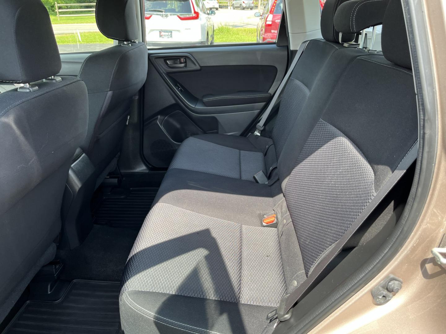 2015 Brown /Black Subaru Forester 2.5i (JF2SJAAC3FH) with an 2.5L H4 SOHC 16V engine, Automatic transmission, located at 11115 Chardon Rd. , Chardon, OH, 44024, (440) 214-9705, 41.580246, -81.241943 - 2015 Subaru Forester 2.5i PZEV – Practical AWD Capability with Strong Everyday Efficiency If you want a compact SUV that prioritizes confidence in changing conditions, this 2015 Subaru Forester 2.5i PZEV is a straightforward choice. The 2.5L engine pairs with Subaru’s full-time Symmetrical All-- Photo#26