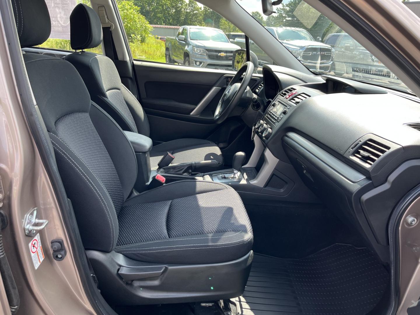 2015 Brown /Black Subaru Forester 2.5i (JF2SJAAC3FH) with an 2.5L H4 SOHC 16V engine, Automatic transmission, located at 11115 Chardon Rd. , Chardon, OH, 44024, (440) 214-9705, 41.580246, -81.241943 - 2015 Subaru Forester 2.5i PZEV – Practical AWD Capability with Strong Everyday Efficiency If you want a compact SUV that prioritizes confidence in changing conditions, this 2015 Subaru Forester 2.5i PZEV is a straightforward choice. The 2.5L engine pairs with Subaru’s full-time Symmetrical All-- Photo#31