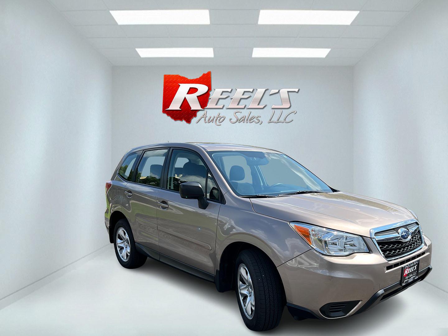 2015 Brown /Black Subaru Forester 2.5i (JF2SJAAC3FH) with an 2.5L H4 SOHC 16V engine, Automatic transmission, located at 11115 Chardon Rd. , Chardon, OH, 44024, (440) 214-9705, 41.580246, -81.241943 - 2015 Subaru Forester 2.5i PZEV – Practical AWD Capability with Strong Everyday Efficiency If you want a compact SUV that prioritizes confidence in changing conditions, this 2015 Subaru Forester 2.5i PZEV is a straightforward choice. The 2.5L engine pairs with Subaru’s full-time Symmetrical All-- Photo#3