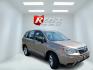2015 Brown /Black Subaru Forester 2.5i (JF2SJAAC3FH) with an 2.5L H4 SOHC 16V engine, Automatic transmission, located at 11115 Chardon Rd. , Chardon, OH, 44024, (440) 214-9705, 41.580246, -81.241943 - 2015 Subaru Forester 2.5i PZEV – Practical AWD Capability with Strong Everyday Efficiency If you want a compact SUV that prioritizes confidence in changing conditions, this 2015 Subaru Forester 2.5i PZEV is a straightforward choice. The 2.5L engine pairs with Subaru’s full-time Symmetrical All-- Photo#3
