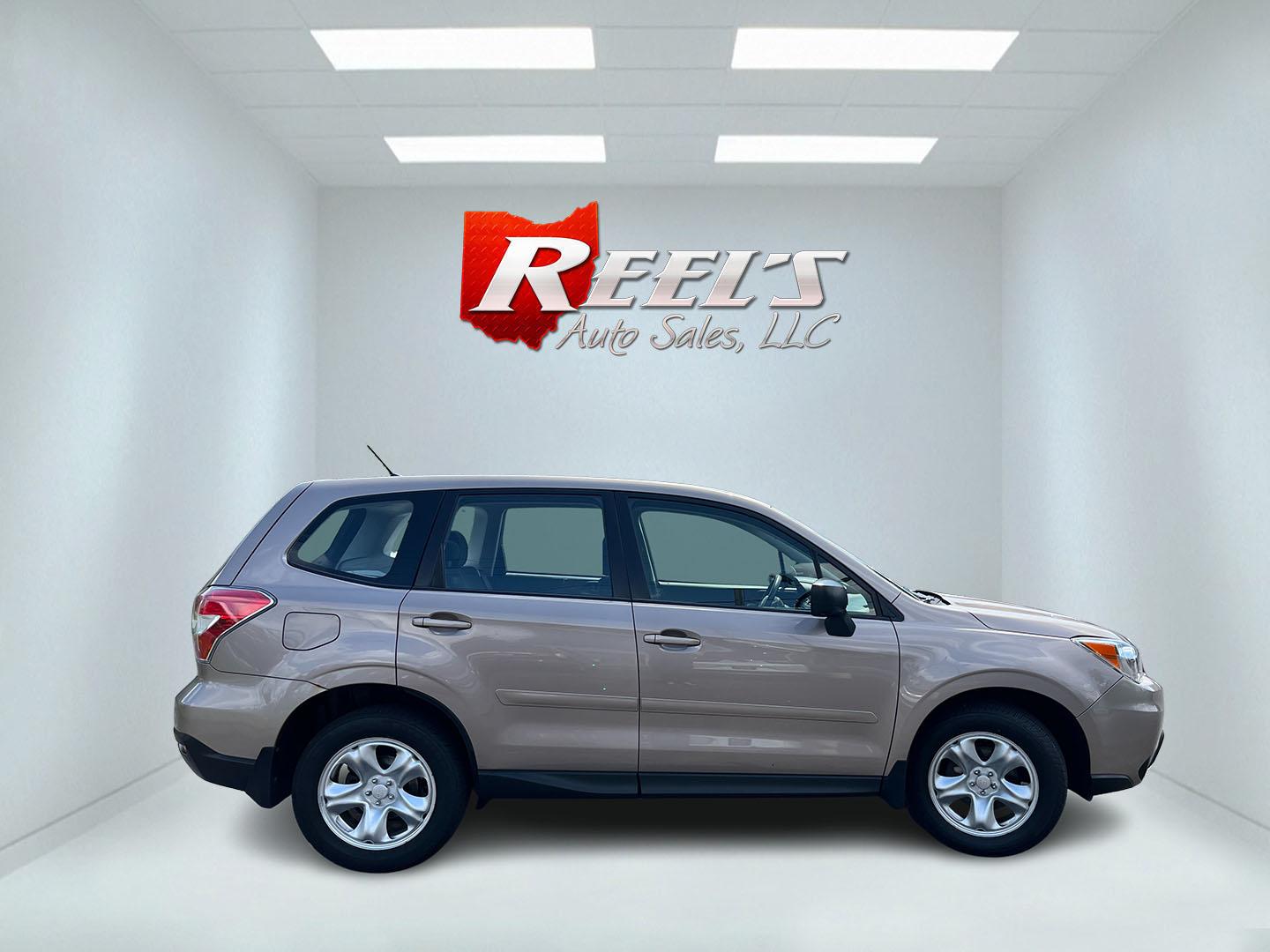 2015 Brown /Black Subaru Forester 2.5i (JF2SJAAC3FH) with an 2.5L H4 SOHC 16V engine, Automatic transmission, located at 11115 Chardon Rd. , Chardon, OH, 44024, (440) 214-9705, 41.580246, -81.241943 - 2015 Subaru Forester 2.5i PZEV – Practical AWD Capability with Strong Everyday Efficiency If you want a compact SUV that prioritizes confidence in changing conditions, this 2015 Subaru Forester 2.5i PZEV is a straightforward choice. The 2.5L engine pairs with Subaru’s full-time Symmetrical All-- Photo#6