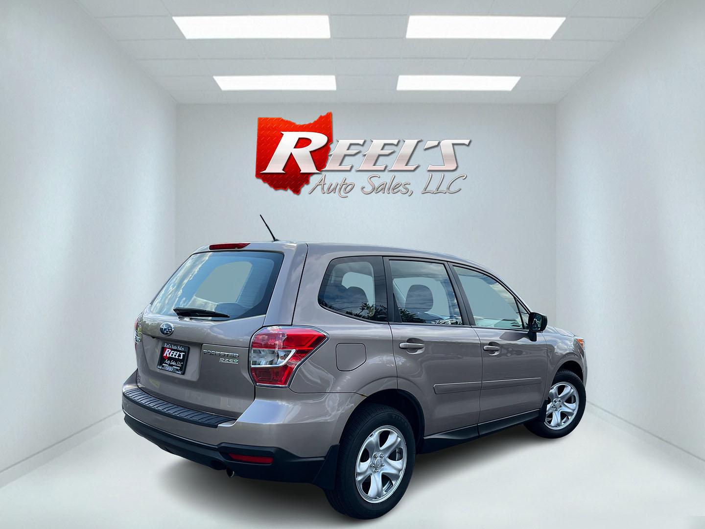 2015 Brown /Black Subaru Forester 2.5i (JF2SJAAC3FH) with an 2.5L H4 SOHC 16V engine, Automatic transmission, located at 11115 Chardon Rd. , Chardon, OH, 44024, (440) 214-9705, 41.580246, -81.241943 - 2015 Subaru Forester 2.5i PZEV – Practical AWD Capability with Strong Everyday Efficiency If you want a compact SUV that prioritizes confidence in changing conditions, this 2015 Subaru Forester 2.5i PZEV is a straightforward choice. The 2.5L engine pairs with Subaru’s full-time Symmetrical All-- Photo#7