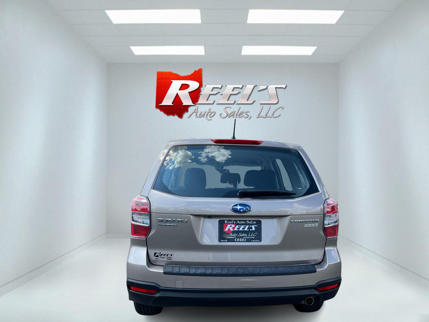 2015 Brown /Black Subaru Forester 2.5i (JF2SJAAC3FH) with an 2.5L H4 SOHC 16V engine, Automatic transmission, located at 11115 Chardon Rd. , Chardon, OH, 44024, (440) 214-9705, 41.580246, -81.241943 - 2015 Subaru Forester 2.5i PZEV – Practical AWD Capability with Strong Everyday Efficiency If you want a compact SUV that prioritizes confidence in changing conditions, this 2015 Subaru Forester 2.5i PZEV is a straightforward choice. The 2.5L engine pairs with Subaru’s full-time Symmetrical All-- Photo#9
