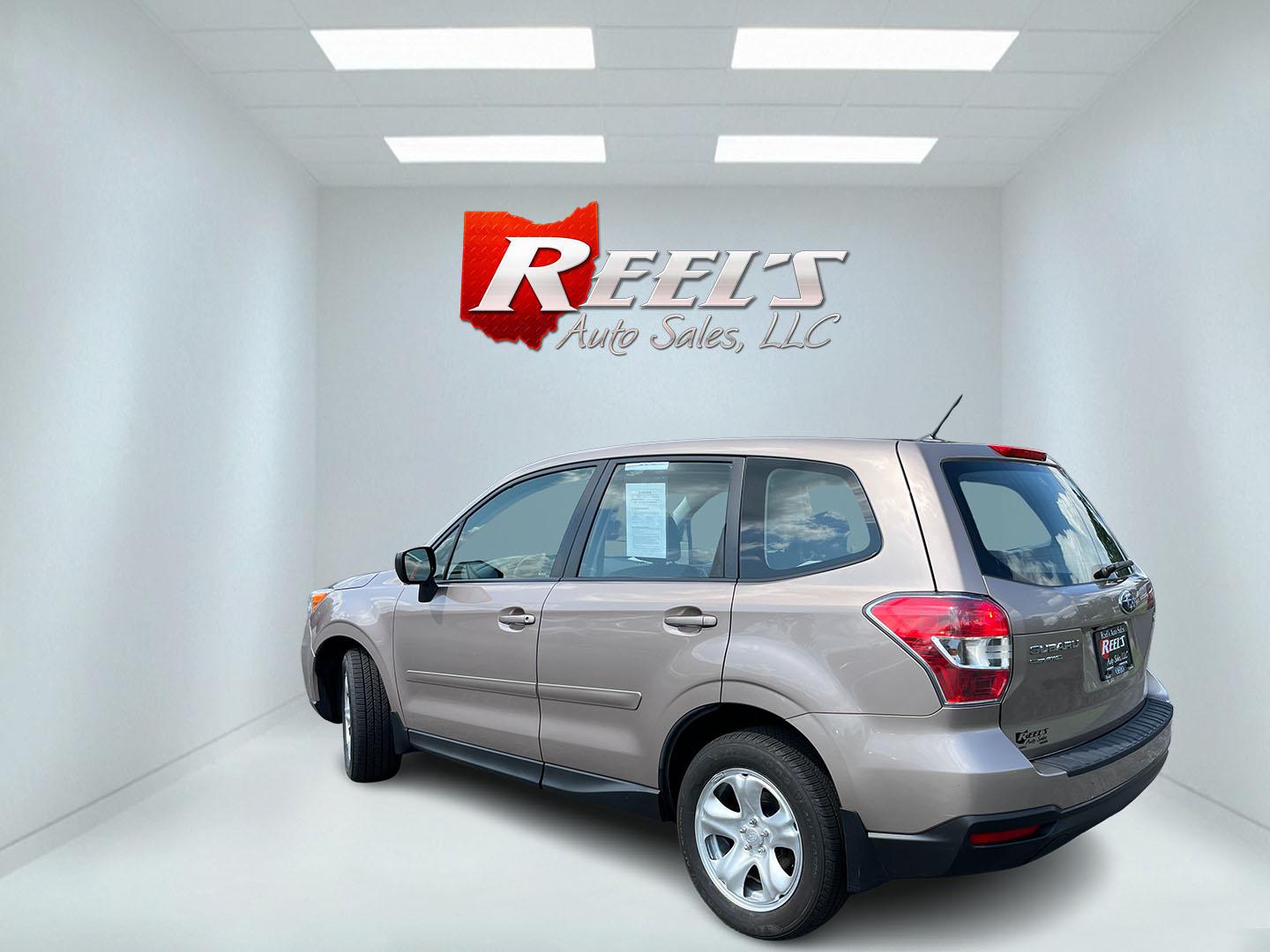 2015 Brown /Black Subaru Forester 2.5i (JF2SJAAC3FH) with an 2.5L H4 SOHC 16V engine, Automatic transmission, located at 11115 Chardon Rd. , Chardon, OH, 44024, (440) 214-9705, 41.580246, -81.241943 - 2015 Subaru Forester 2.5i PZEV – Practical AWD Capability with Strong Everyday Efficiency If you want a compact SUV that prioritizes confidence in changing conditions, this 2015 Subaru Forester 2.5i PZEV is a straightforward choice. The 2.5L engine pairs with Subaru’s full-time Symmetrical All-- Photo#10