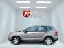 2015 Brown /Black Subaru Forester 2.5i (JF2SJAAC3FH) with an 2.5L H4 SOHC 16V engine, Automatic transmission, located at 11115 Chardon Rd. , Chardon, OH, 44024, (440) 214-9705, 41.580246, -81.241943 - 2015 Subaru Forester 2.5i PZEV – Practical AWD Capability with Strong Everyday Efficiency If you want a compact SUV that prioritizes confidence in changing conditions, this 2015 Subaru Forester 2.5i PZEV is a straightforward choice. The 2.5L engine pairs with Subaru’s full-time Symmetrical All-- Photo#12
