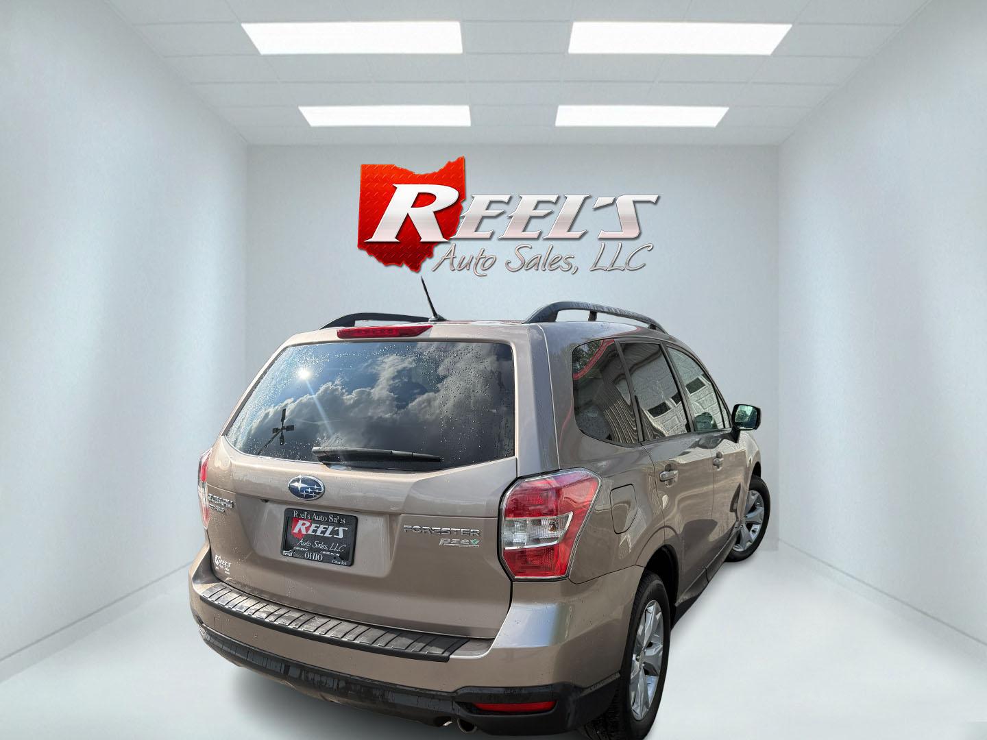 2014 Brown /Black Subaru Forester 2.5i Premium (JF2SJAEC2EH) with an 2.5L H4 SOHC 16V engine, Automatic transmission, located at 547 E. Main St., Orwell, OH, 44076, (440) 437-5893, 41.535435, -80.847855 - 2014 Subaru Forester 2.5i Premium PZEV – Practical AWD Comfort with Everyday Convenience If you want a compact SUV that prioritizes confidence and usability, this 2014 Subaru Forester 2.5i Premium PZEV is a solid choice. The 2.5L engine pairs with Subaru’s full-time Symmetrical All-Wheel Drive- Photo#28