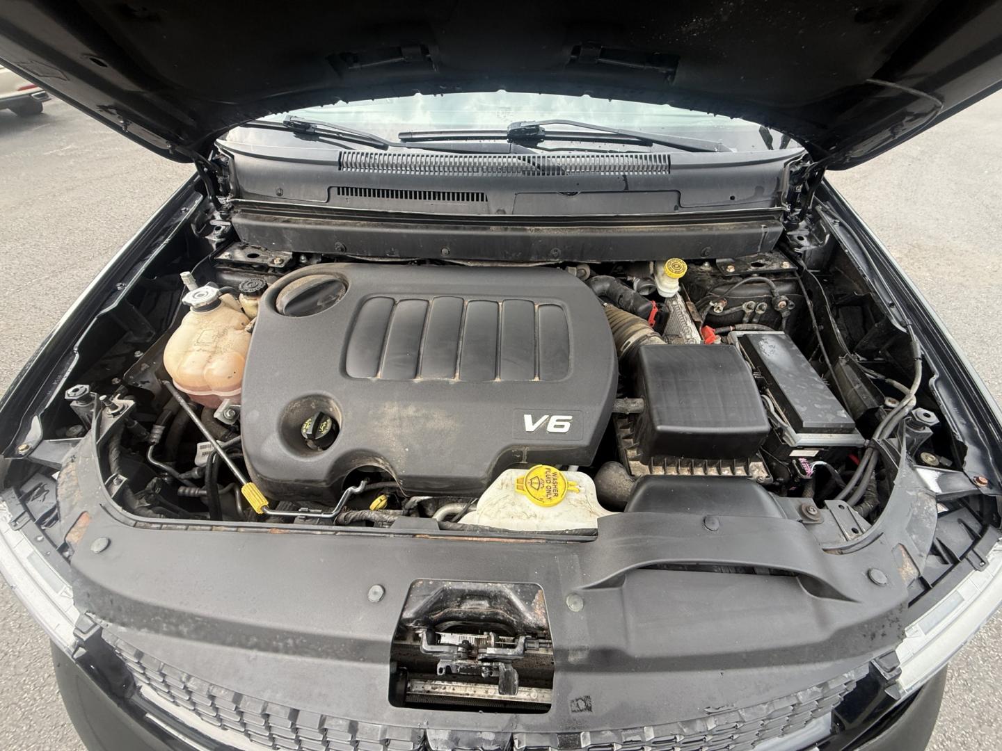 2017 Black /Black Dodge Journey Crossroad AWD (3C4PDDGG1HT) with an 3.6L V6 DOHC 24V engine, Automatic transmission, located at 547 E. Main St., Orwell, OH, 44076, (440) 437-5893, 41.535435, -80.847855 - 2017 Dodge Journey Crossroad Plus AWD – Family Space with V6 Power and Everyday Comfort If you need a midsize SUV with room for the family and enough equipment to make daily driving easier, this 2017 Dodge Journey Crossroad Plus AWD is worth a look. The 3.6L Pentastar V6 and 6-speed automatic del- Photo#7