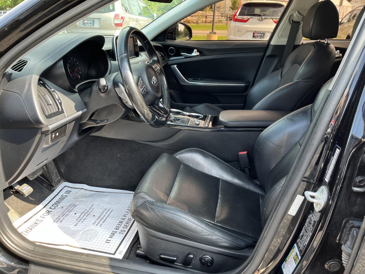 2018 Black /Black Kia Stinger Base RWD (KNAE15LA7J6) with an 2.0L I4 DOHC 16V Turbo engine, Automatic transmission, located at 11115 Chardon Rd. , Chardon, OH, 44024, (440) 214-9705, 41.580246, -81.241943 - 2018 Kia Stinger RWD – A Sporty Fastback with Everyday Usability If you want a sedan that feels more engaging than a typical commuter car, this 2018 Kia Stinger RWD is a strong option. The 2.0L Twin-Scroll Turbo I4 and 8-speed automatic deliver responsive power, while selectable driving modes let- Photo#17