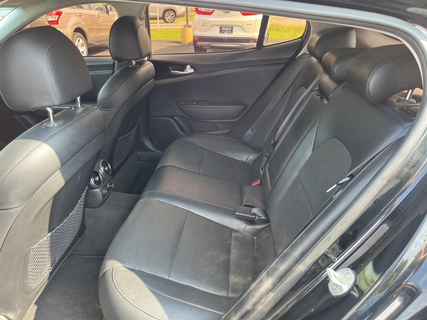 2018 Black /Black Kia Stinger Base RWD (KNAE15LA7J6) with an 2.0L I4 DOHC 16V Turbo engine, Automatic transmission, located at 11115 Chardon Rd. , Chardon, OH, 44024, (440) 214-9705, 41.580246, -81.241943 - 2018 Kia Stinger RWD – A Sporty Fastback with Everyday Usability If you want a sedan that feels more engaging than a typical commuter car, this 2018 Kia Stinger RWD is a strong option. The 2.0L Twin-Scroll Turbo I4 and 8-speed automatic deliver responsive power, while selectable driving modes let- Photo#28