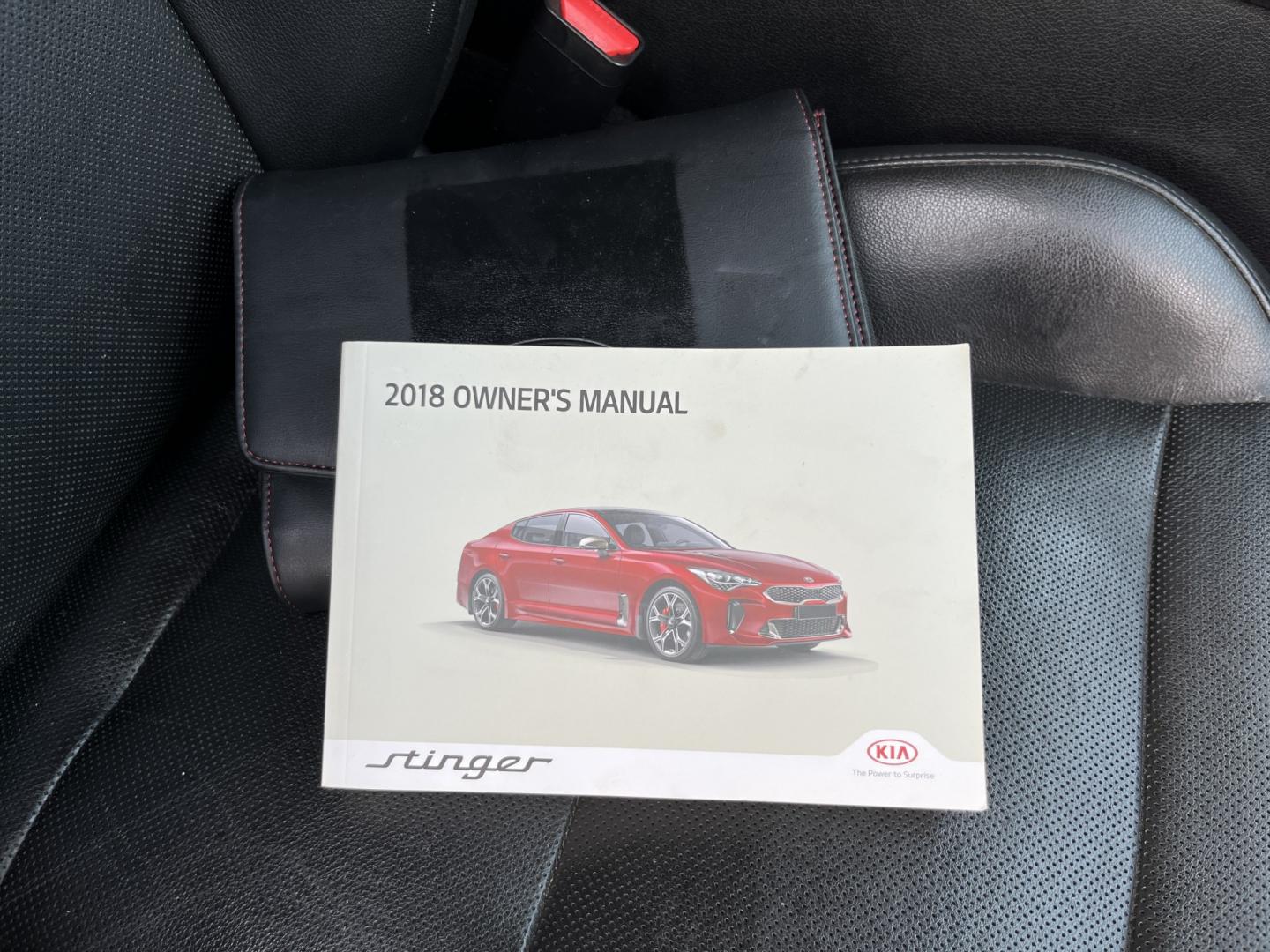 2018 Black /Black Kia Stinger Base RWD (KNAE15LA7J6) with an 2.0L I4 DOHC 16V Turbo engine, Automatic transmission, located at 11115 Chardon Rd. , Chardon, OH, 44024, (440) 214-9705, 41.580246, -81.241943 - 2018 Kia Stinger RWD – A Sporty Fastback with Everyday Usability If you want a sedan that feels more engaging than a typical commuter car, this 2018 Kia Stinger RWD is a strong option. The 2.0L Twin-Scroll Turbo I4 and 8-speed automatic deliver responsive power, while selectable driving modes let- Photo#37