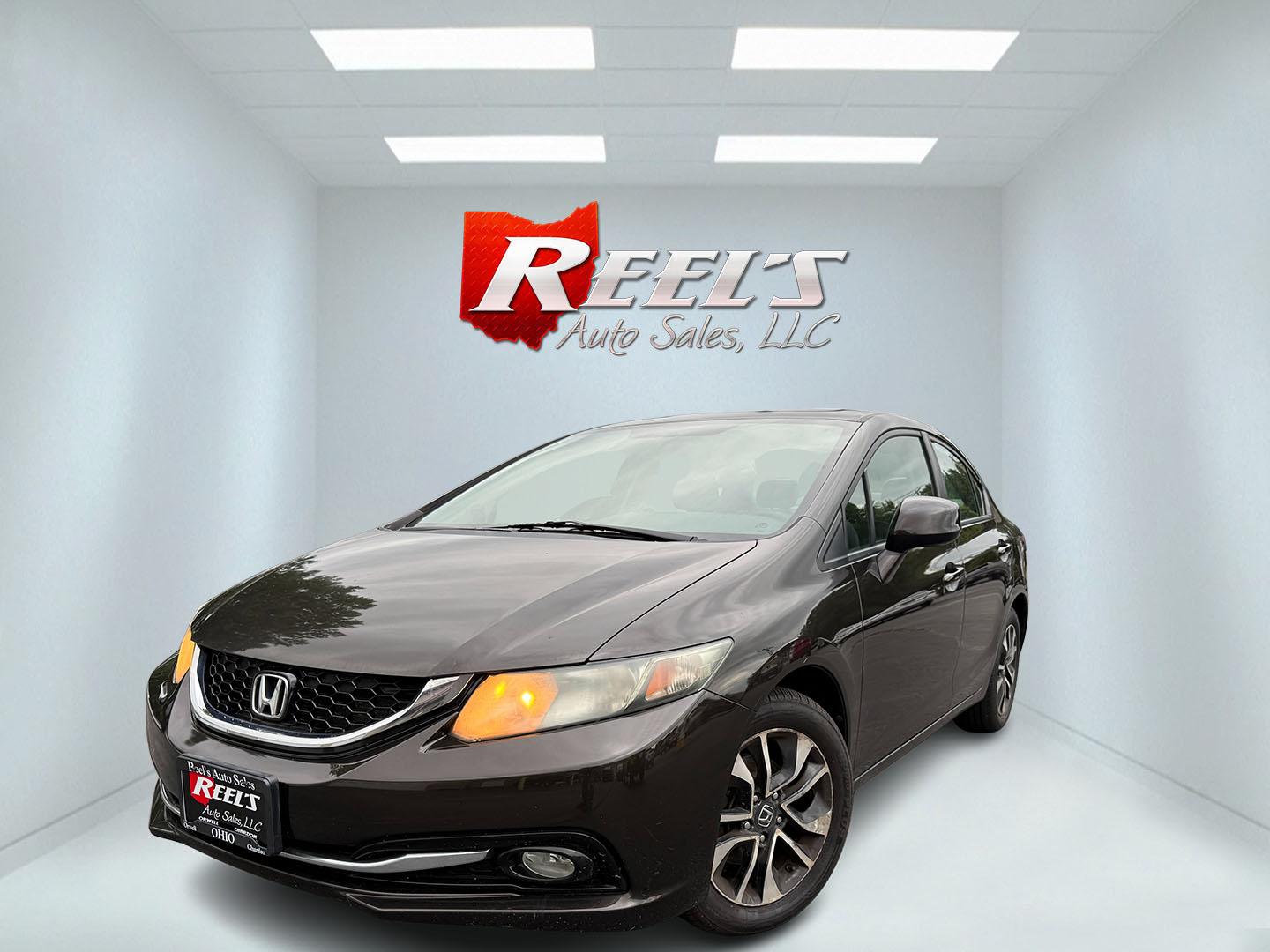 2013 Black /Black Honda Civic EX-L Sedan 5-Speed AT (2HGFB2F98DH) with an 1.8L I4 SOHC 16V engine, Automatic transmission, located at 547 E. Main St., Orwell, OH, 44076, (440) 437-5893, 41.535435, -80.847855 - 2013 Honda Civic EX-L – Efficient, Comfortable, and Easy to Own If you want a compact sedan that prioritizes efficiency and everyday comfort, this 2013 Honda Civic EX-L is a smart option. The reliable 1.8L engine and 5-speed automatic deliver smooth performance and an impressive 39 MPG highway ra- Photo#0