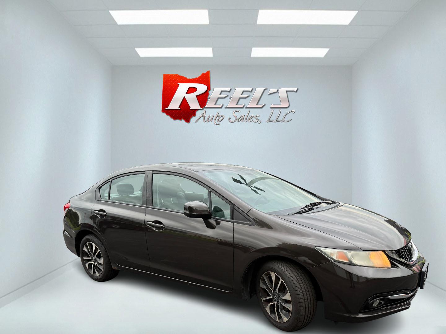 2013 Black /Black Honda Civic EX-L Sedan 5-Speed AT (2HGFB2F98DH) with an 1.8L I4 SOHC 16V engine, Automatic transmission, located at 547 E. Main St., Orwell, OH, 44076, (440) 437-5893, 41.535435, -80.847855 - 2013 Honda Civic EX-L – Efficient, Comfortable, and Easy to Own If you want a compact sedan that prioritizes efficiency and everyday comfort, this 2013 Honda Civic EX-L is a smart option. The reliable 1.8L engine and 5-speed automatic deliver smooth performance and an impressive 39 MPG highway ra- Photo#3