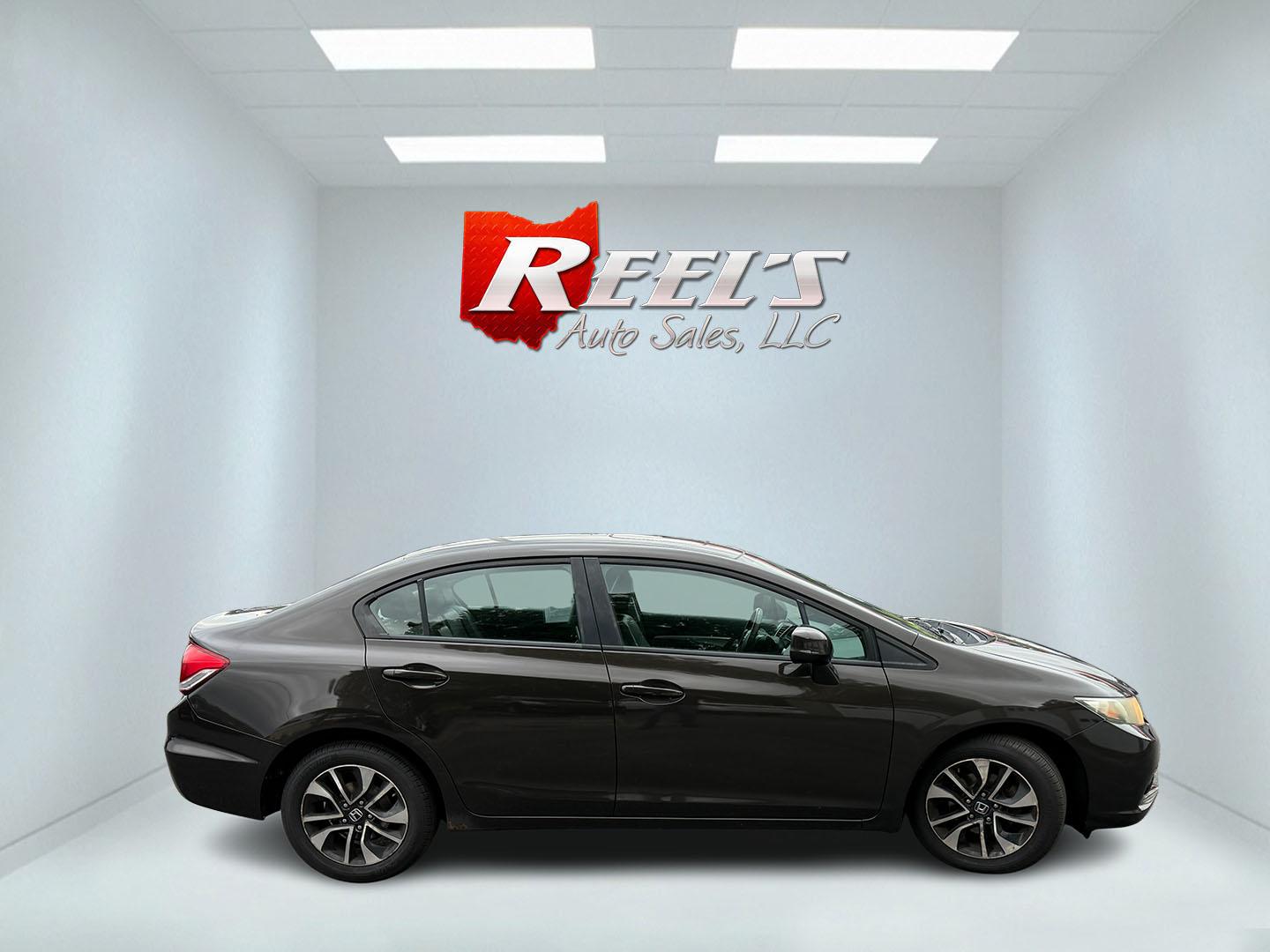 2013 Black /Black Honda Civic EX-L Sedan 5-Speed AT (2HGFB2F98DH) with an 1.8L I4 SOHC 16V engine, Automatic transmission, located at 547 E. Main St., Orwell, OH, 44076, (440) 437-5893, 41.535435, -80.847855 - 2013 Honda Civic EX-L – Efficient, Comfortable, and Easy to Own If you want a compact sedan that prioritizes efficiency and everyday comfort, this 2013 Honda Civic EX-L is a smart option. The reliable 1.8L engine and 5-speed automatic deliver smooth performance and an impressive 39 MPG highway ra- Photo#6