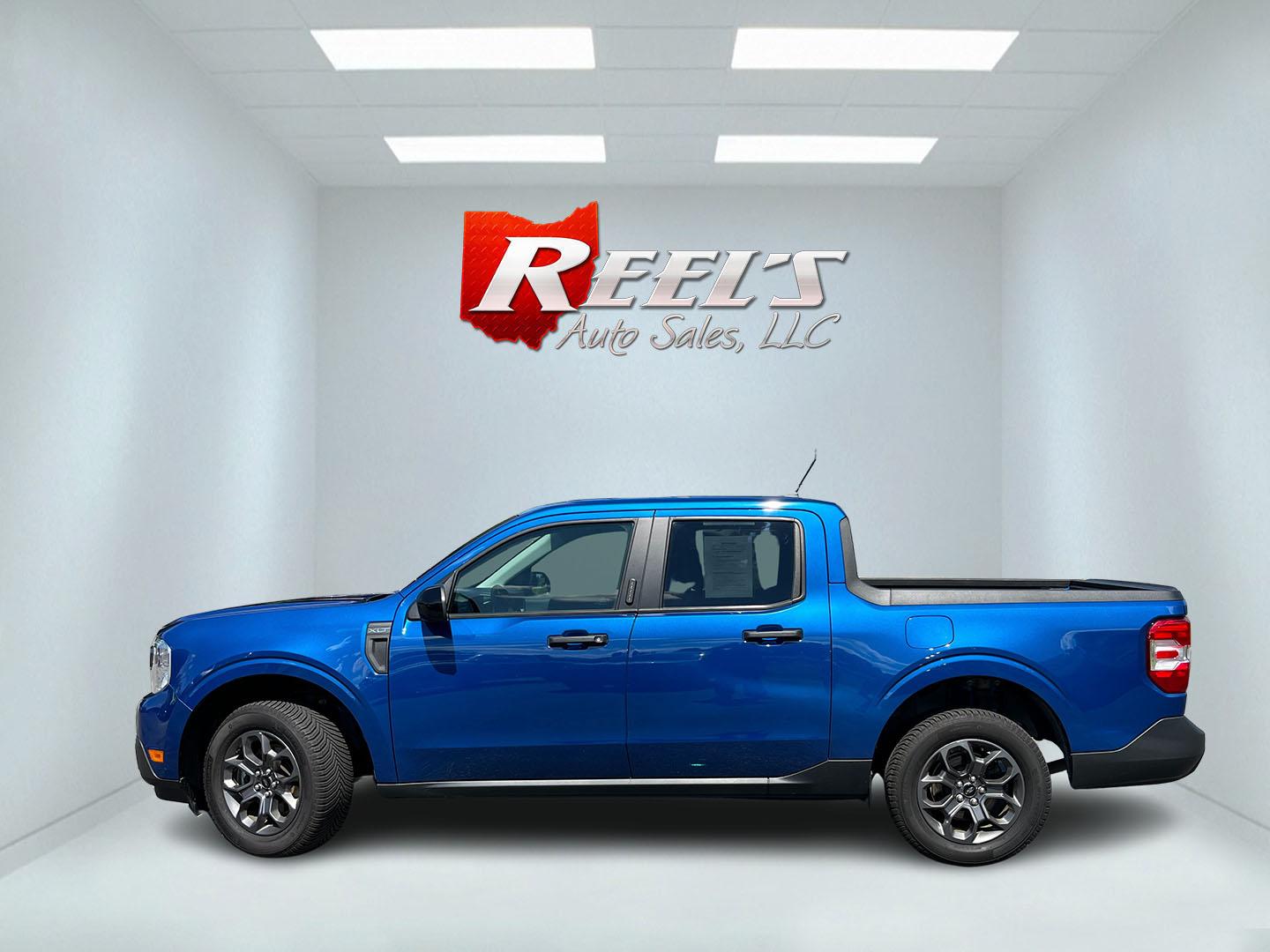 2024 Blue /Black Ford Maverick XLT (3FTTW8J98RR) with an 2.0L I4 DOHC 16V Turbo engine, Automatic transmission, located at 11115 Chardon Rd. , Chardon, OH, 44024, (440) 214-9705, 41.580246, -81.241943 - 2024 Ford Maverick XLT AWD – Compact Truck Convenience with Modern Features If you want a smaller truck that is easy to live with and still useful, this 2024 Ford Maverick XLT AWD is a strong match. The 2.0L EcoBoost engine and 8-speed automatic deliver responsive power and a solid 29 MPG highway- Photo#11