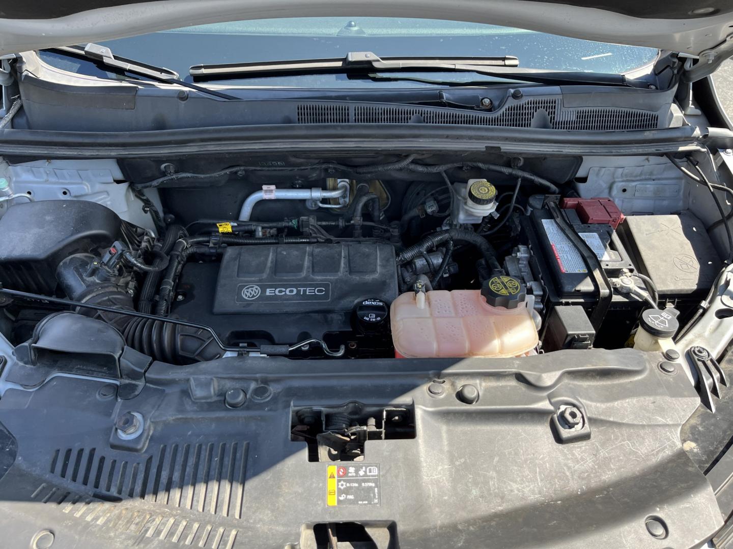 2018 Silver /Black Buick Encore Sport Touring AWD (KL4CJ2SB5JB) with an 1.4L I4 DOHC 16V TURBO engine, Automatic transmission, located at 11115 Chardon Rd. , Chardon, OH, 44024, (440) 214-9705, 41.580246, -81.241943 - 2018 Buick Encore Sport Touring AWD – Compact Efficiency with a More Refined Feel If you want a smaller crossover that still feels a step up in comfort and style, this 2018 Buick Encore Sport Touring AWD is a solid option. The 1.4L Turbocharged EcoTec engine and 6-speed automatic deliver responsi- Photo#13