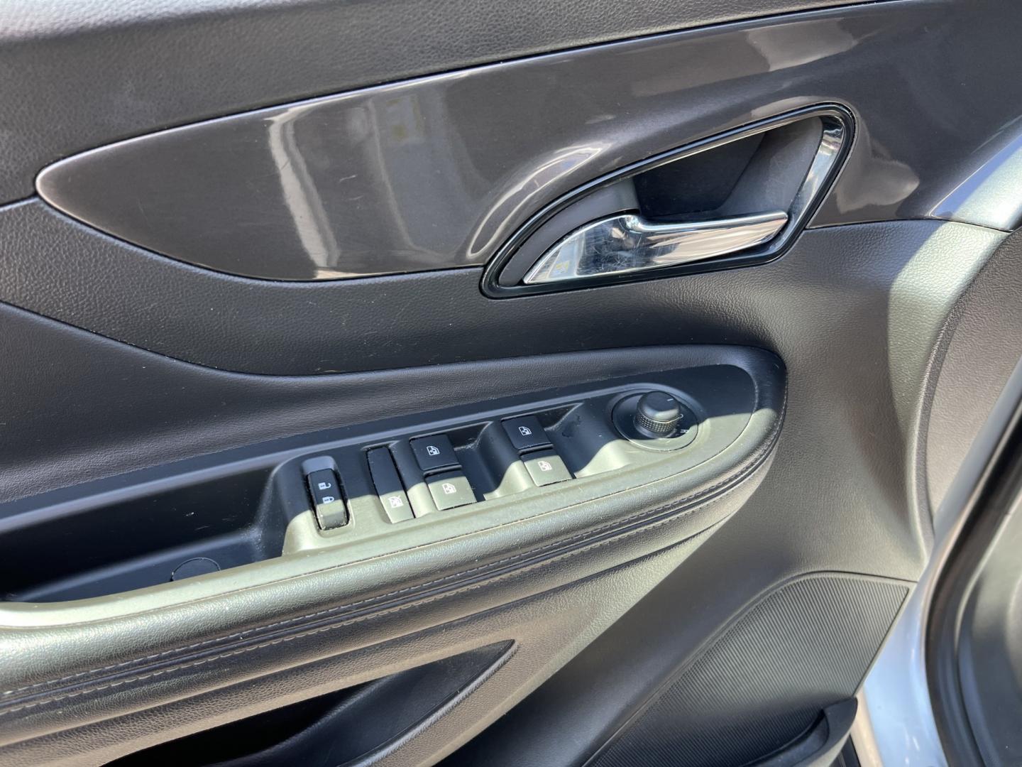 2018 Silver /Black Buick Encore Sport Touring AWD (KL4CJ2SB5JB) with an 1.4L I4 DOHC 16V TURBO engine, Automatic transmission, located at 11115 Chardon Rd. , Chardon, OH, 44024, (440) 214-9705, 41.580246, -81.241943 - 2018 Buick Encore Sport Touring AWD – Compact Efficiency with a More Refined Feel If you want a smaller crossover that still feels a step up in comfort and style, this 2018 Buick Encore Sport Touring AWD is a solid option. The 1.4L Turbocharged EcoTec engine and 6-speed automatic deliver responsi- Photo#16