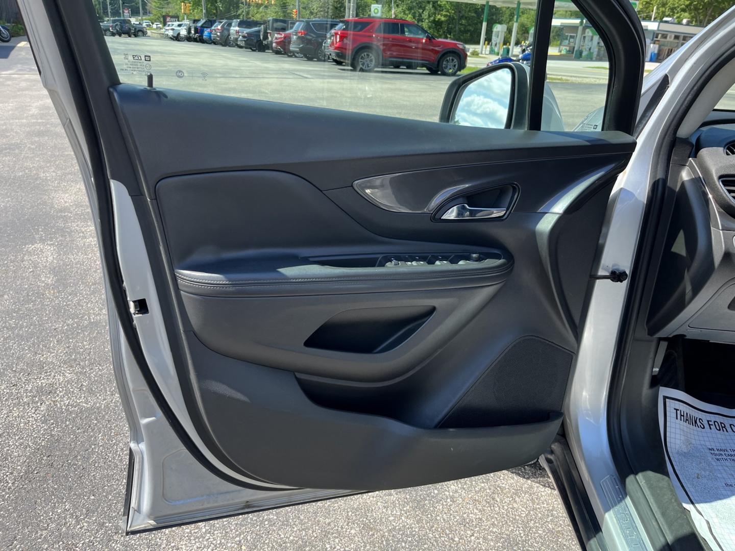 2018 Silver /Black Buick Encore Sport Touring AWD (KL4CJ2SB5JB) with an 1.4L I4 DOHC 16V TURBO engine, Automatic transmission, located at 11115 Chardon Rd. , Chardon, OH, 44024, (440) 214-9705, 41.580246, -81.241943 - 2018 Buick Encore Sport Touring AWD – Compact Efficiency with a More Refined Feel If you want a smaller crossover that still feels a step up in comfort and style, this 2018 Buick Encore Sport Touring AWD is a solid option. The 1.4L Turbocharged EcoTec engine and 6-speed automatic deliver responsi- Photo#15