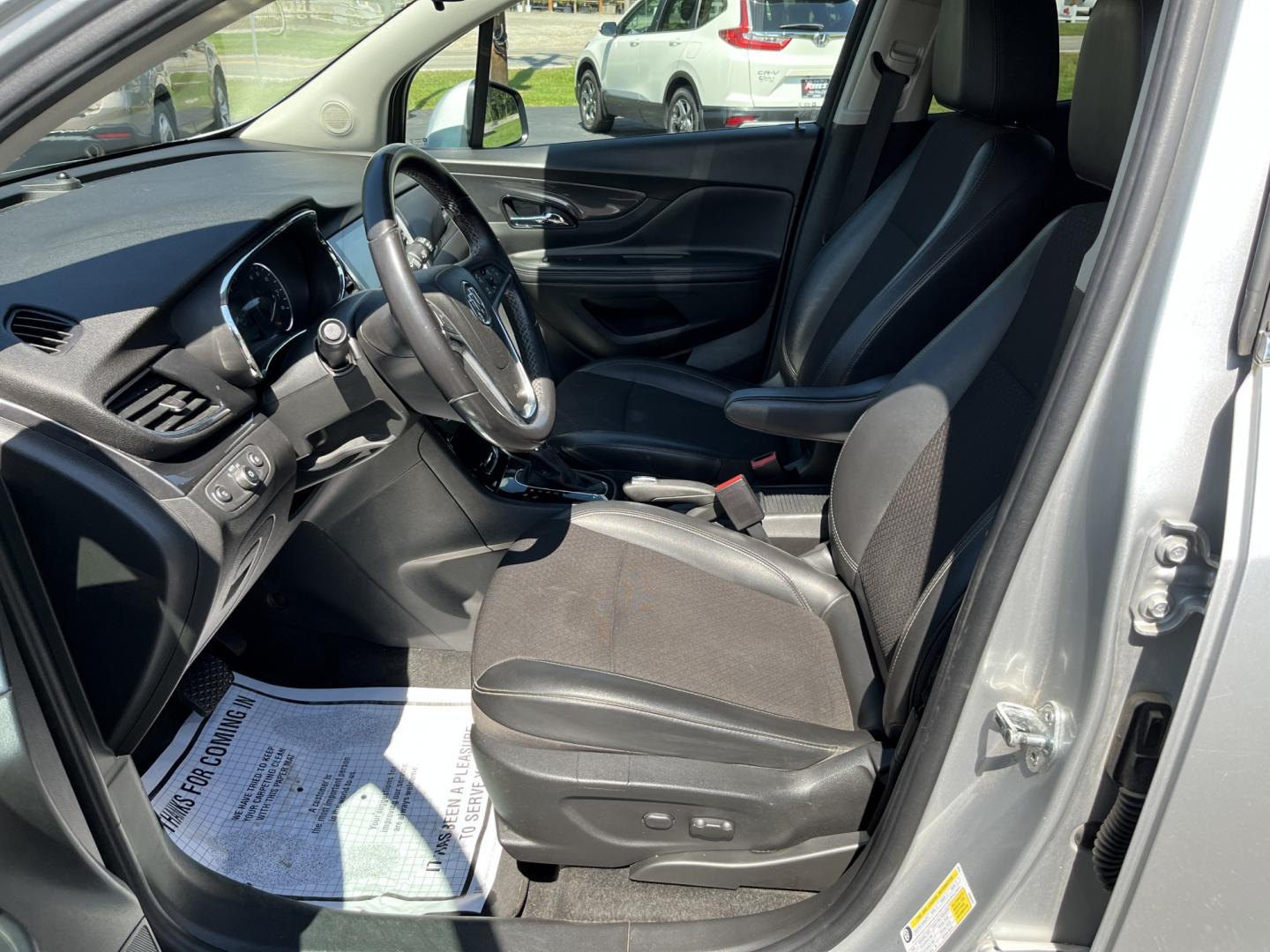 2018 Silver /Black Buick Encore Sport Touring AWD (KL4CJ2SB5JB) with an 1.4L I4 DOHC 16V TURBO engine, Automatic transmission, located at 11115 Chardon Rd. , Chardon, OH, 44024, (440) 214-9705, 41.580246, -81.241943 - 2018 Buick Encore Sport Touring AWD – Compact Efficiency with a More Refined Feel If you want a smaller crossover that still feels a step up in comfort and style, this 2018 Buick Encore Sport Touring AWD is a solid option. The 1.4L Turbocharged EcoTec engine and 6-speed automatic deliver responsi- Photo#17