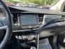 2018 Silver /Black Buick Encore Sport Touring AWD (KL4CJ2SB5JB) with an 1.4L I4 DOHC 16V TURBO engine, Automatic transmission, located at 11115 Chardon Rd. , Chardon, OH, 44024, (440) 214-9705, 41.580246, -81.241943 - 2018 Buick Encore Sport Touring AWD – Compact Efficiency with a More Refined Feel If you want a smaller crossover that still feels a step up in comfort and style, this 2018 Buick Encore Sport Touring AWD is a solid option. The 1.4L Turbocharged EcoTec engine and 6-speed automatic deliver responsi- Photo#22