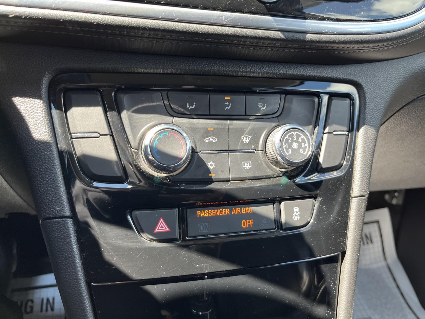 2018 Silver /Black Buick Encore Sport Touring AWD (KL4CJ2SB5JB) with an 1.4L I4 DOHC 16V TURBO engine, Automatic transmission, located at 11115 Chardon Rd. , Chardon, OH, 44024, (440) 214-9705, 41.580246, -81.241943 - 2018 Buick Encore Sport Touring AWD – Compact Efficiency with a More Refined Feel If you want a smaller crossover that still feels a step up in comfort and style, this 2018 Buick Encore Sport Touring AWD is a solid option. The 1.4L Turbocharged EcoTec engine and 6-speed automatic deliver responsi- Photo#24