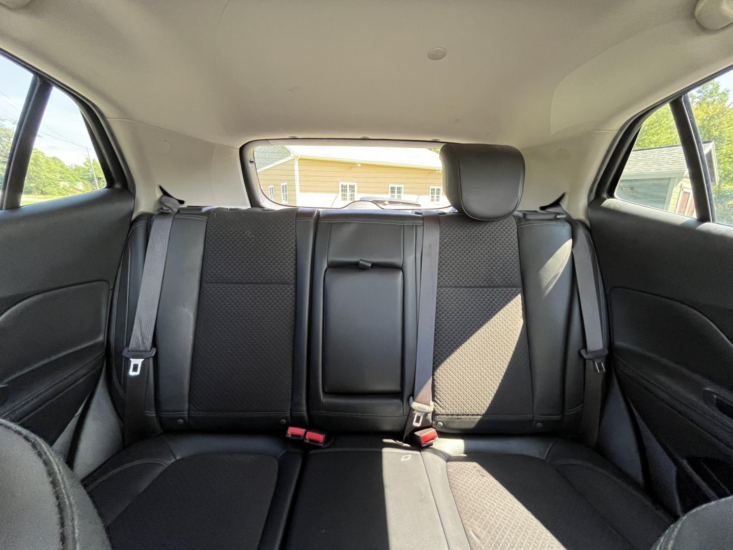 2018 Silver /Black Buick Encore Sport Touring AWD (KL4CJ2SB5JB) with an 1.4L I4 DOHC 16V TURBO engine, Automatic transmission, located at 11115 Chardon Rd. , Chardon, OH, 44024, (440) 214-9705, 41.580246, -81.241943 - 2018 Buick Encore Sport Touring AWD – Compact Efficiency with a More Refined Feel If you want a smaller crossover that still feels a step up in comfort and style, this 2018 Buick Encore Sport Touring AWD is a solid option. The 1.4L Turbocharged EcoTec engine and 6-speed automatic deliver responsi- Photo#25