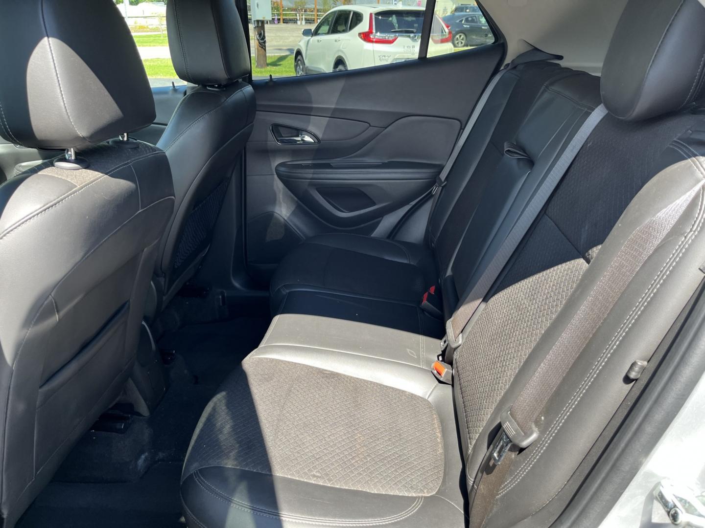 2018 Silver /Black Buick Encore Sport Touring AWD (KL4CJ2SB5JB) with an 1.4L I4 DOHC 16V TURBO engine, Automatic transmission, located at 11115 Chardon Rd. , Chardon, OH, 44024, (440) 214-9705, 41.580246, -81.241943 - 2018 Buick Encore Sport Touring AWD – Compact Efficiency with a More Refined Feel If you want a smaller crossover that still feels a step up in comfort and style, this 2018 Buick Encore Sport Touring AWD is a solid option. The 1.4L Turbocharged EcoTec engine and 6-speed automatic deliver responsi- Photo#27