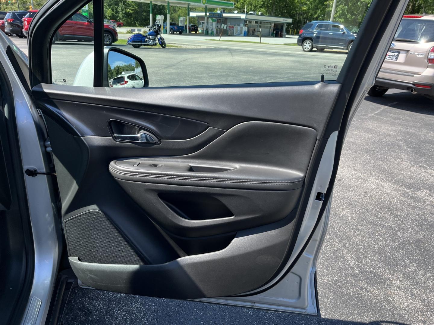 2018 Silver /Black Buick Encore Sport Touring AWD (KL4CJ2SB5JB) with an 1.4L I4 DOHC 16V TURBO engine, Automatic transmission, located at 11115 Chardon Rd. , Chardon, OH, 44024, (440) 214-9705, 41.580246, -81.241943 - 2018 Buick Encore Sport Touring AWD – Compact Efficiency with a More Refined Feel If you want a smaller crossover that still feels a step up in comfort and style, this 2018 Buick Encore Sport Touring AWD is a solid option. The 1.4L Turbocharged EcoTec engine and 6-speed automatic deliver responsi- Photo#31