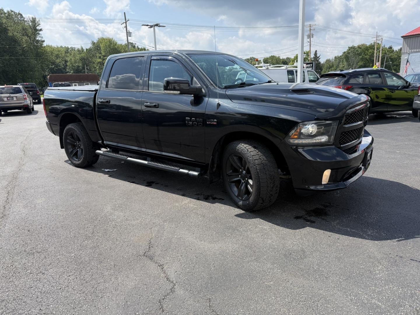 2017 Black /Black RAM 1500 Sport Crew Cab SWB 4WD (1C6RR7MT9HS) with an 5.7L V8 OHV 16V engine, Automatic transmission, located at 547 E. Main St., Orwell, OH, 44076, (440) 437-5893, 41.535435, -80.847855 - Towing Capability If you want a full-size truck that looks sharp and is ready to work, this 2017 Ram 1500 Sport Crew Cab 4WD is a strong option. The 5.7L HEMI V8 and 8-speed automatic deliver dependable power, while 3.92 gearing and on-demand 4WD support a capable 10,140 lb towing capacity. It also- Photo#3
