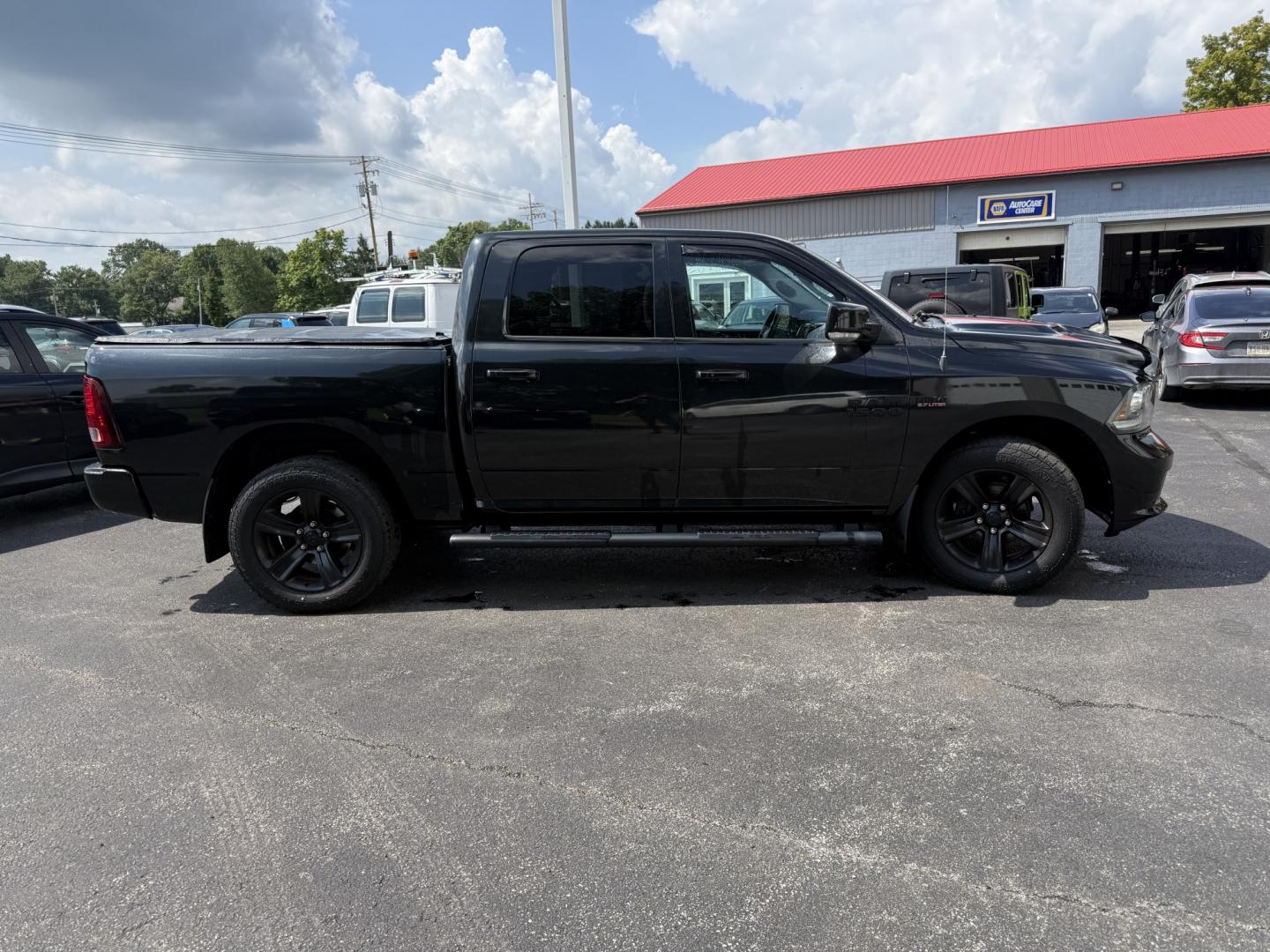 2017 Black /Black RAM 1500 Sport Crew Cab SWB 4WD (1C6RR7MT9HS) with an 5.7L V8 OHV 16V engine, Automatic transmission, located at 547 E. Main St., Orwell, OH, 44076, (440) 437-5893, 41.535435, -80.847855 - Towing Capability If you want a full-size truck that looks sharp and is ready to work, this 2017 Ram 1500 Sport Crew Cab 4WD is a strong option. The 5.7L HEMI V8 and 8-speed automatic deliver dependable power, while 3.92 gearing and on-demand 4WD support a capable 10,140 lb towing capacity. It also- Photo#27